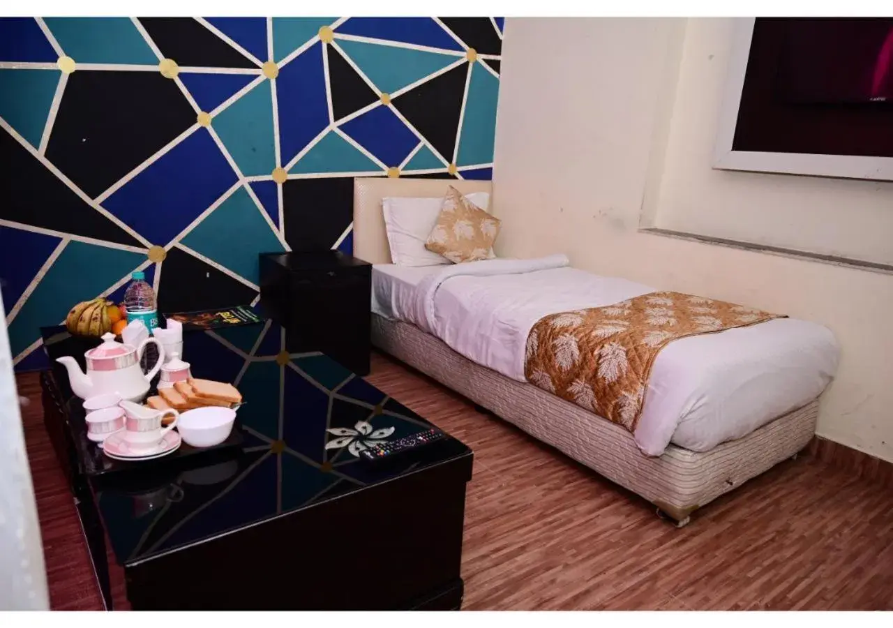 Bedroom, Bed in Hotel Krishna Pride Bedroom, Bed in Hotel Krishna Pride