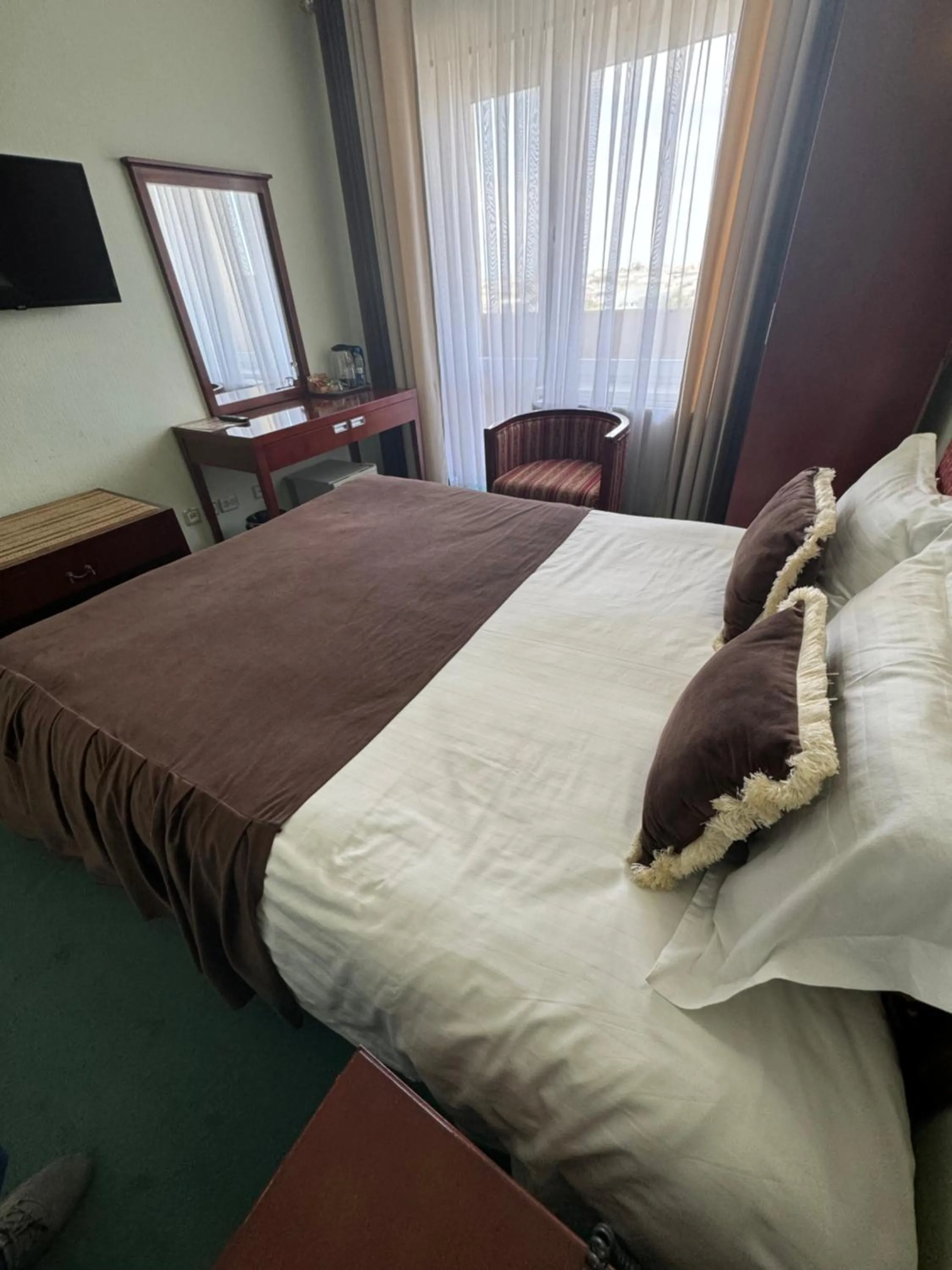 Bed in Hotel Grand Bukhara