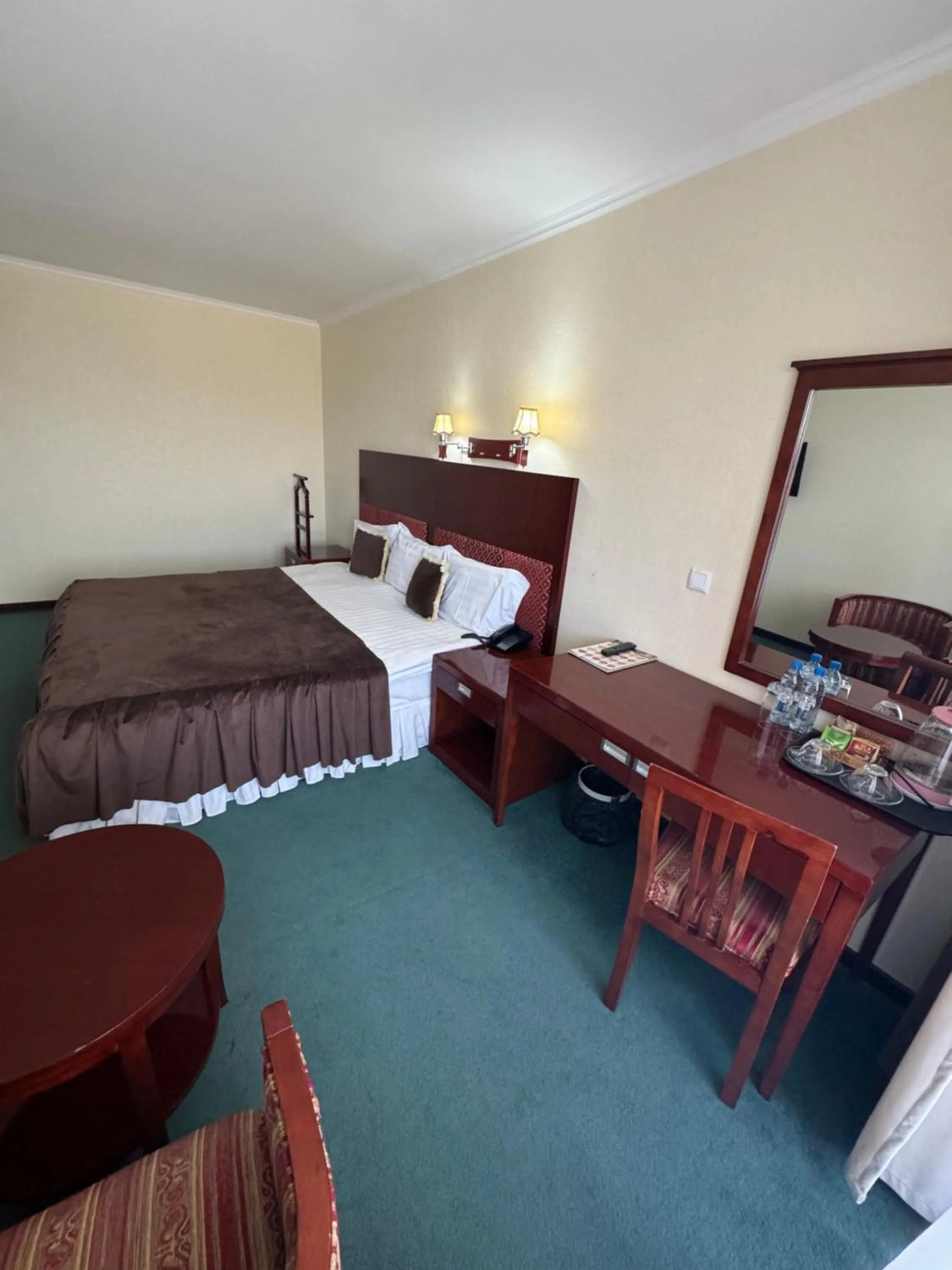 Bed in Hotel Grand Bukhara