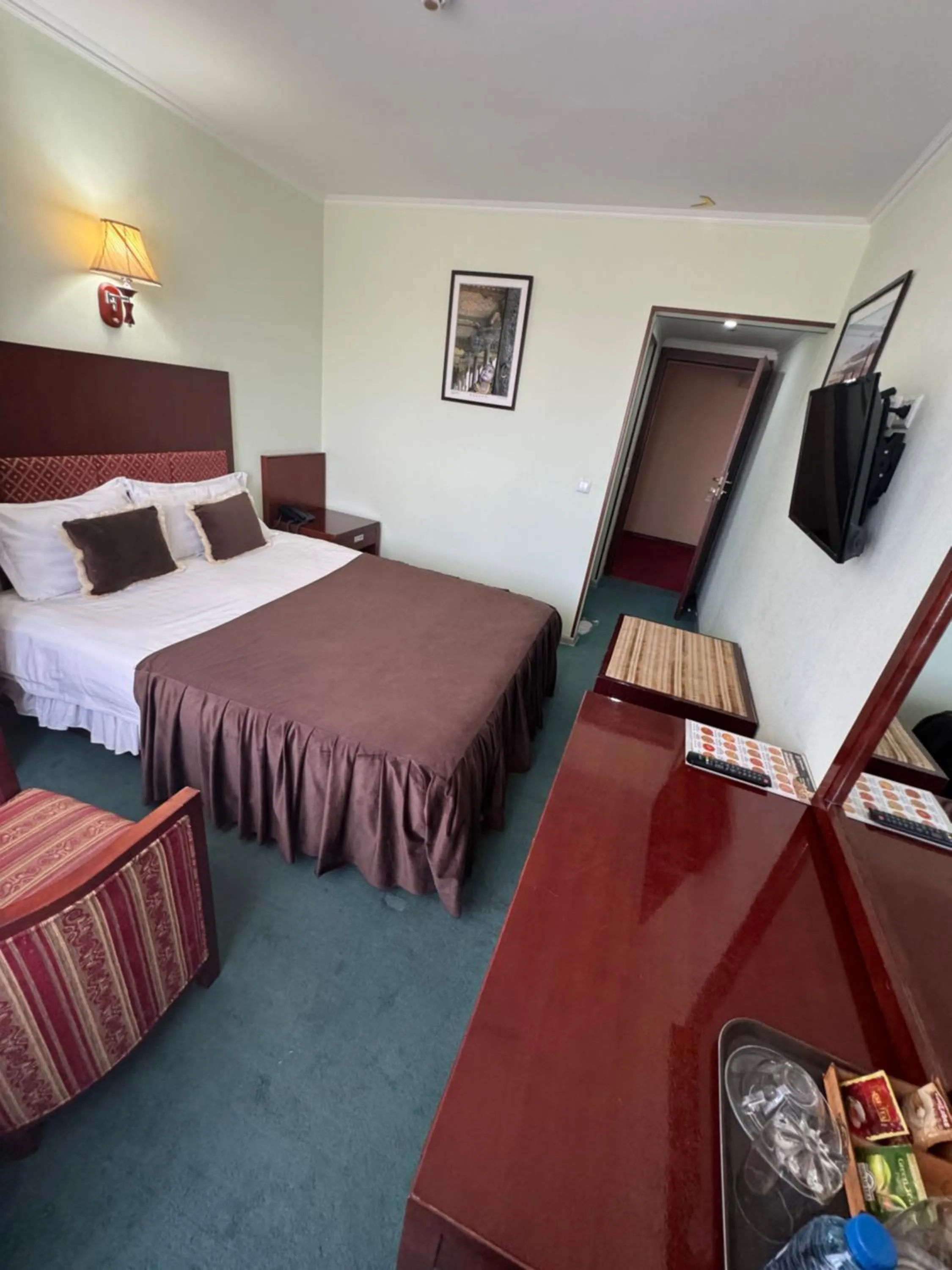 Bed in Hotel Grand Bukhara