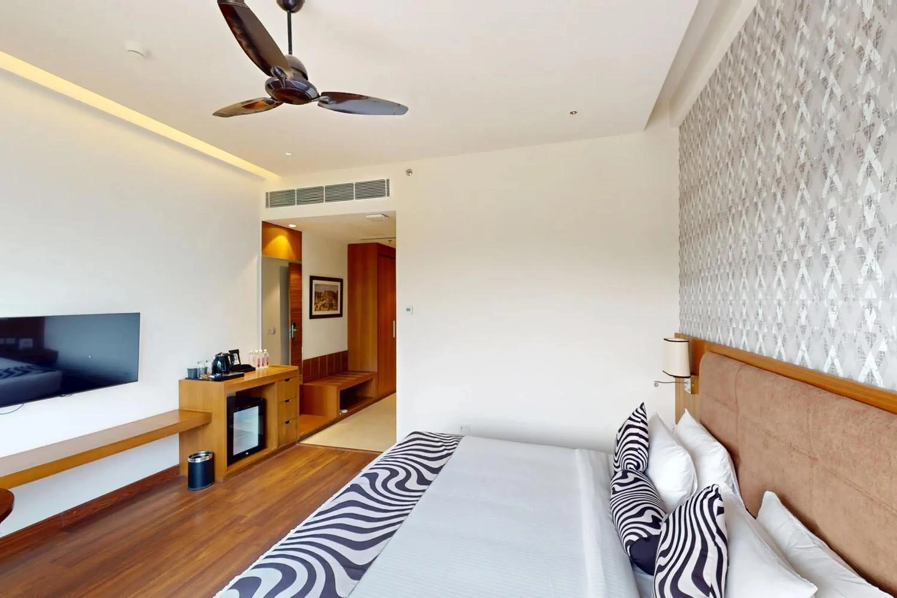 Bed in Sunday Resort & Spa by CheckIn Manesar Gurugram