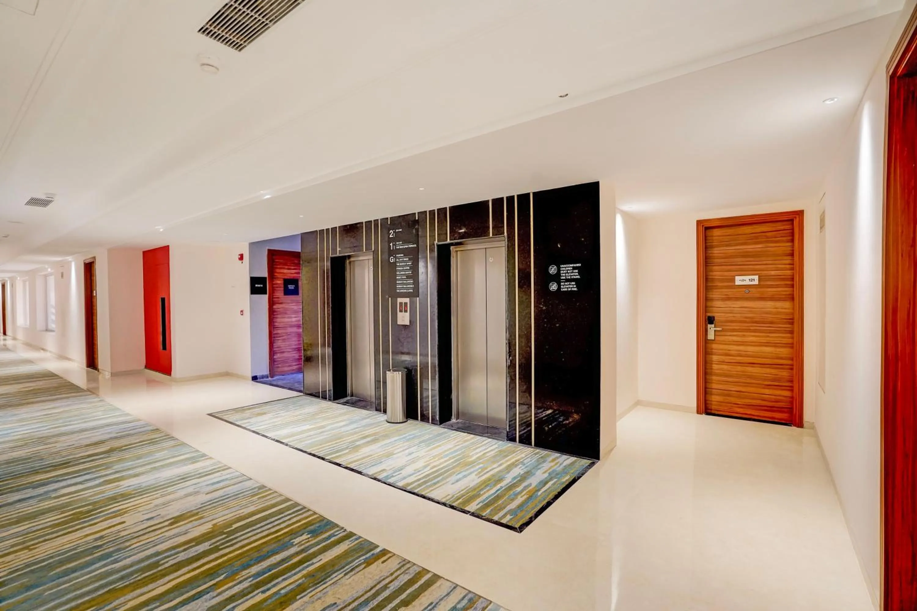 Lobby or reception, Bed in Sunday Resort & Spa by CheckIn Manesar Gurugram