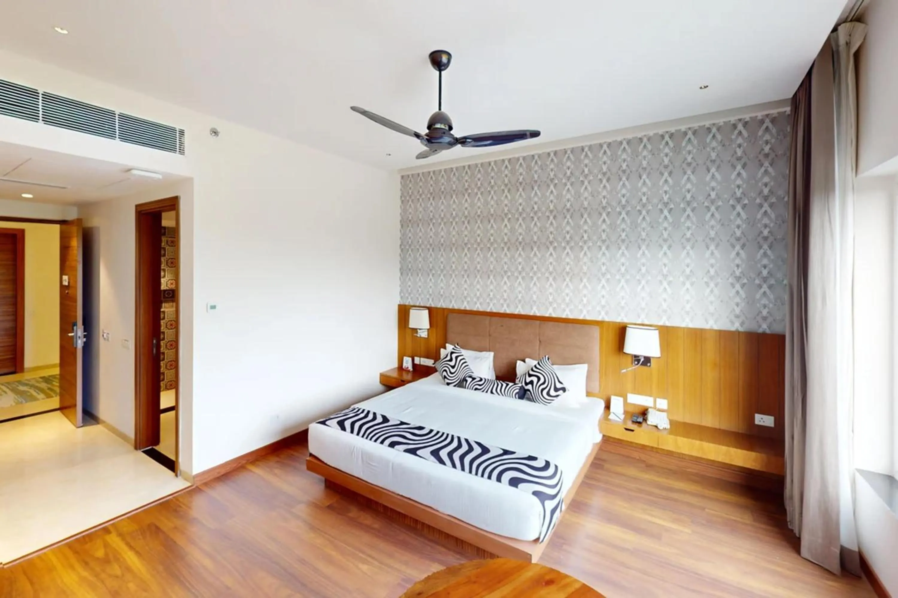 Bed in Sunday Resort & Spa by CheckIn Manesar Gurugram