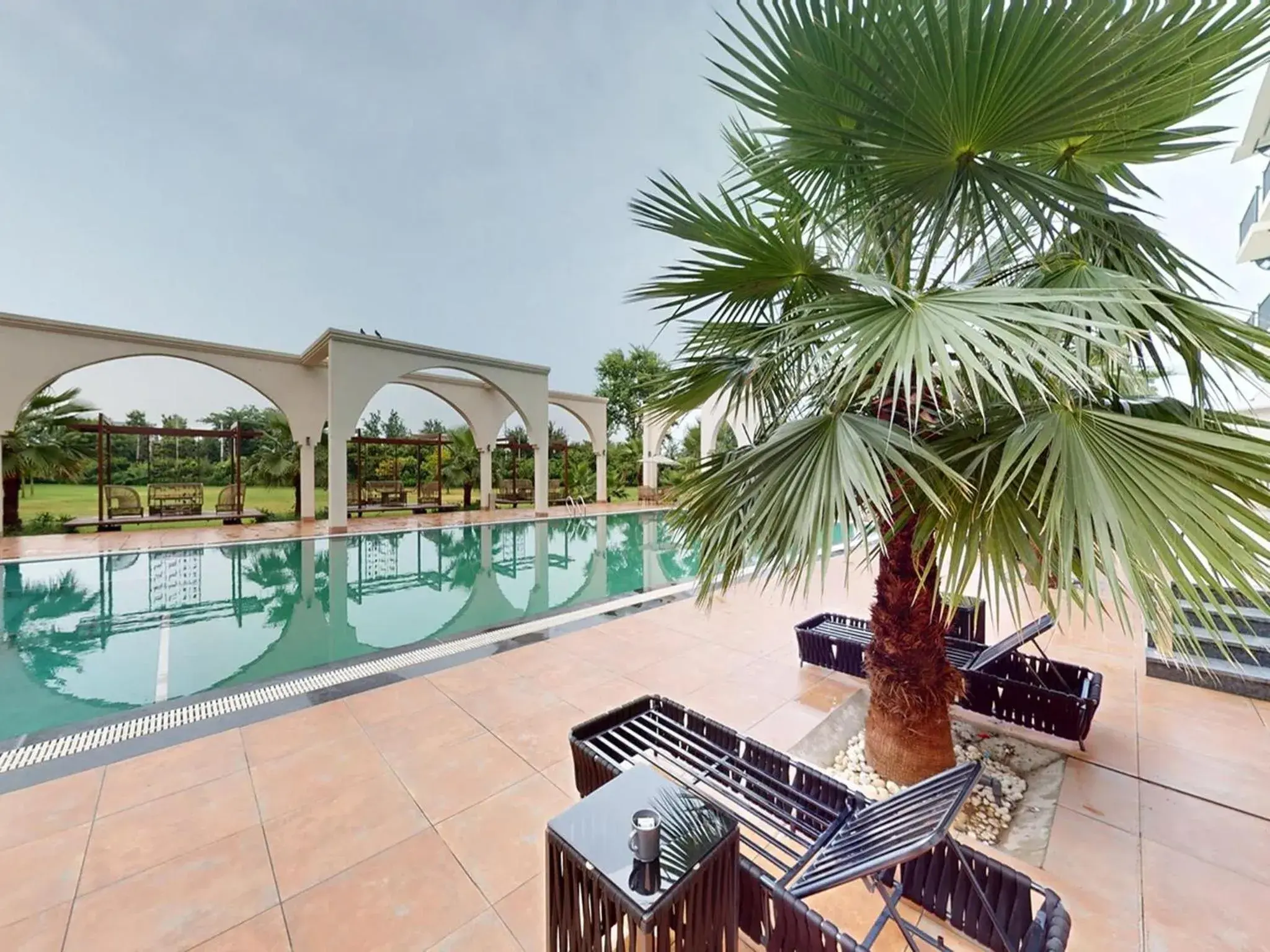 Swimming pool in Sunday Resort & Spa by CheckIn Manesar Gurugram Swimming pool in Sunday Resort & Spa by CheckIn Manesar Gurugram