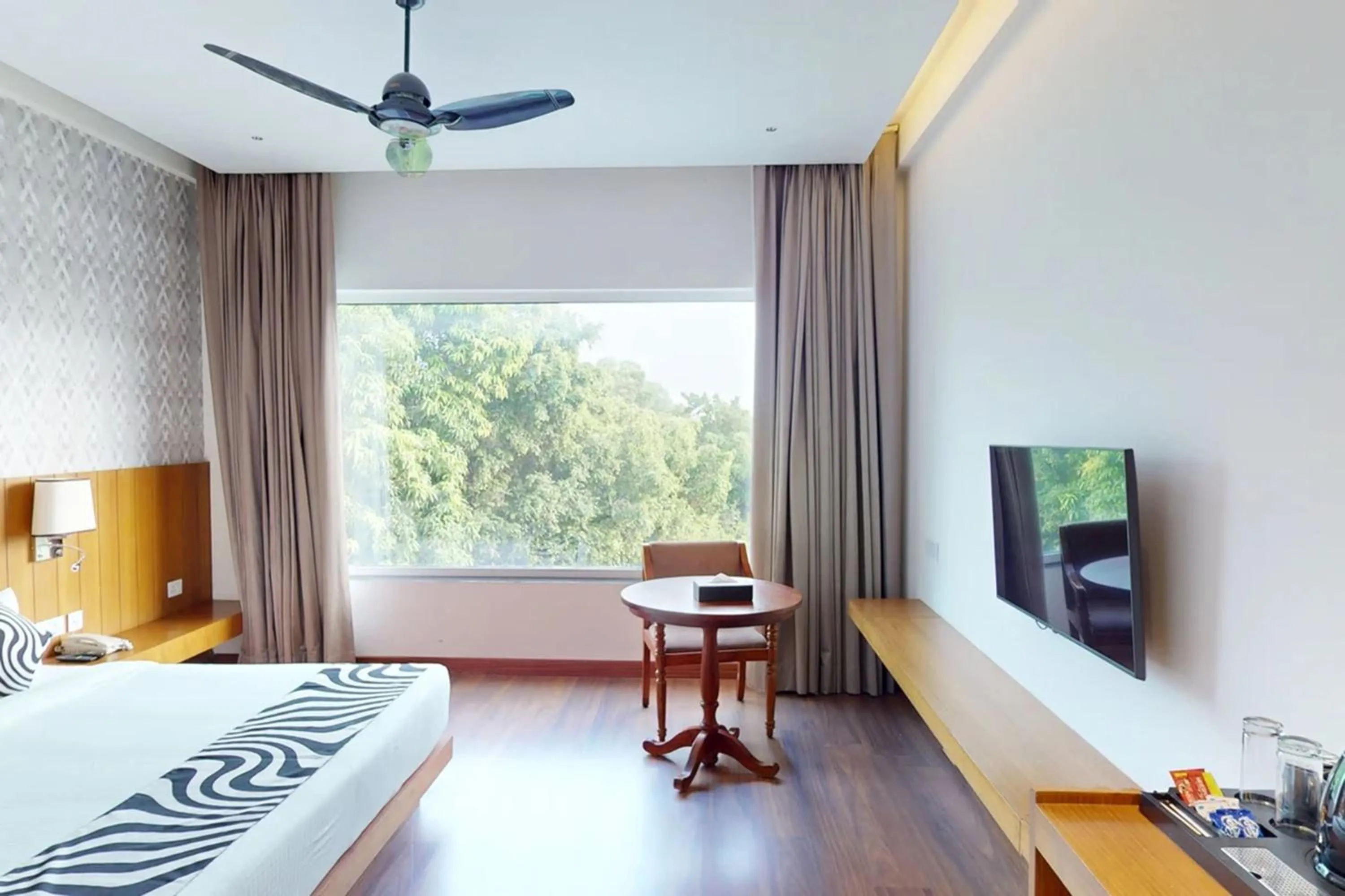 Bed in Sunday Resort & Spa by CheckIn Manesar Gurugram