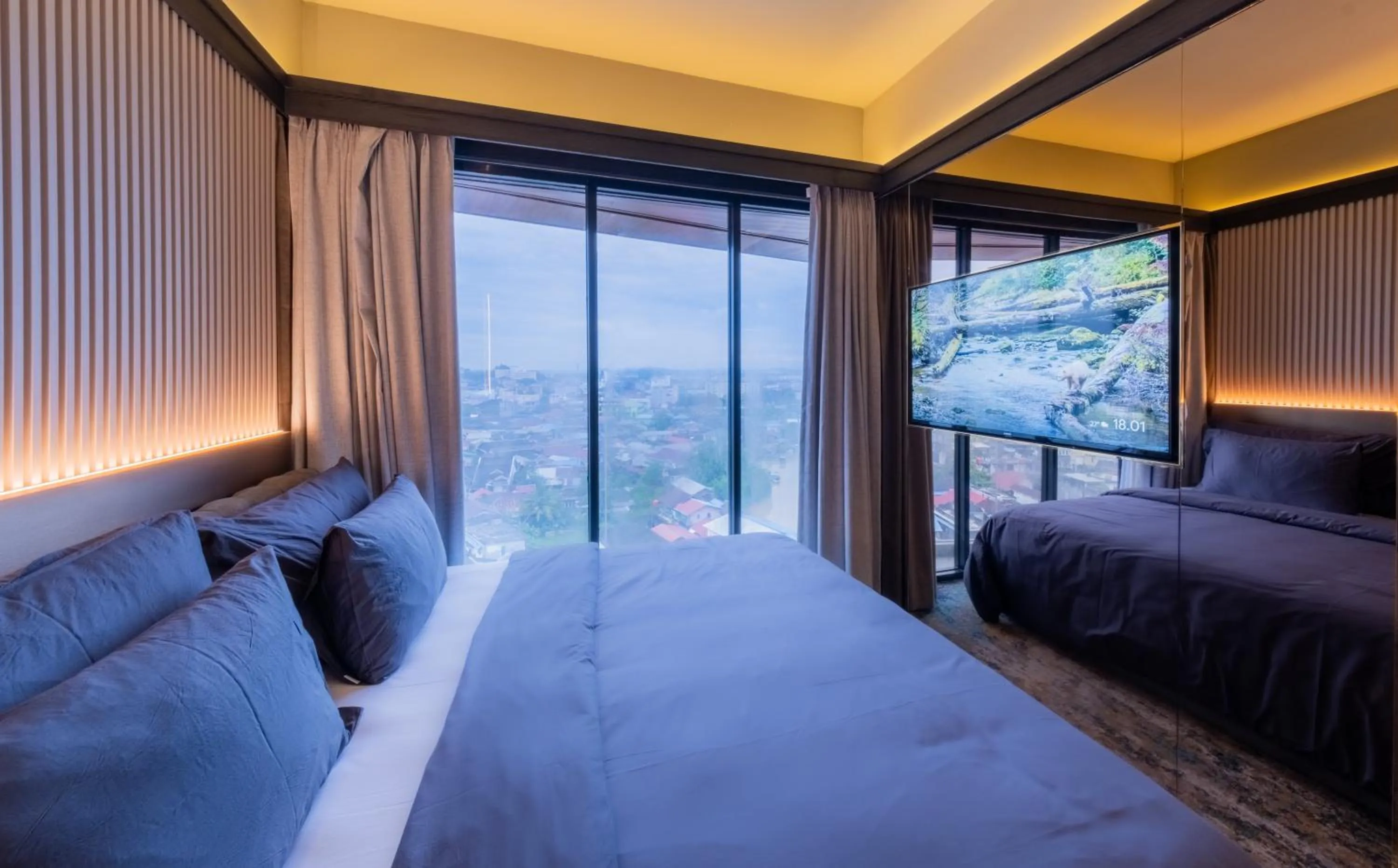 Bed in The All - Suite Pentacity Hotel Balikpapan