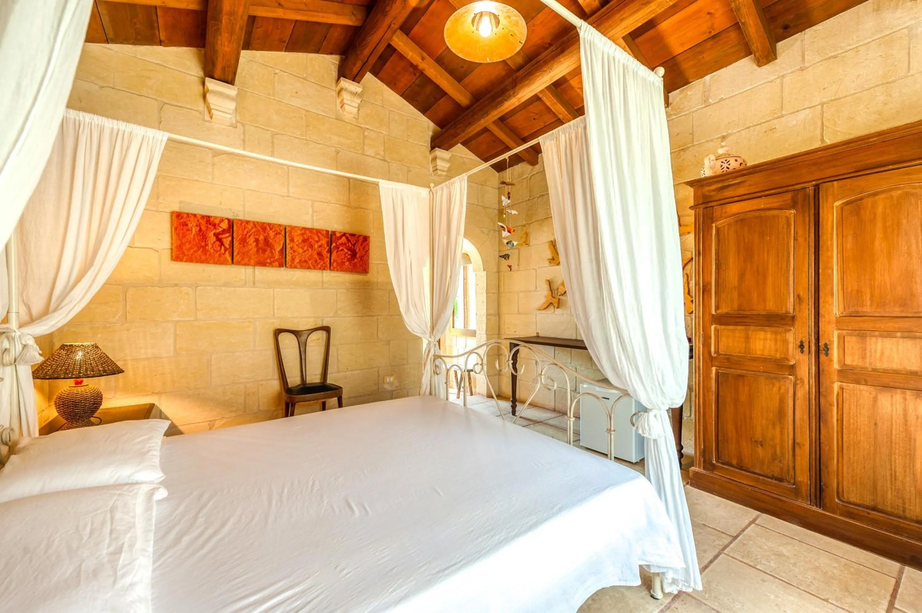 Living room, Bed in Masseria Copertini