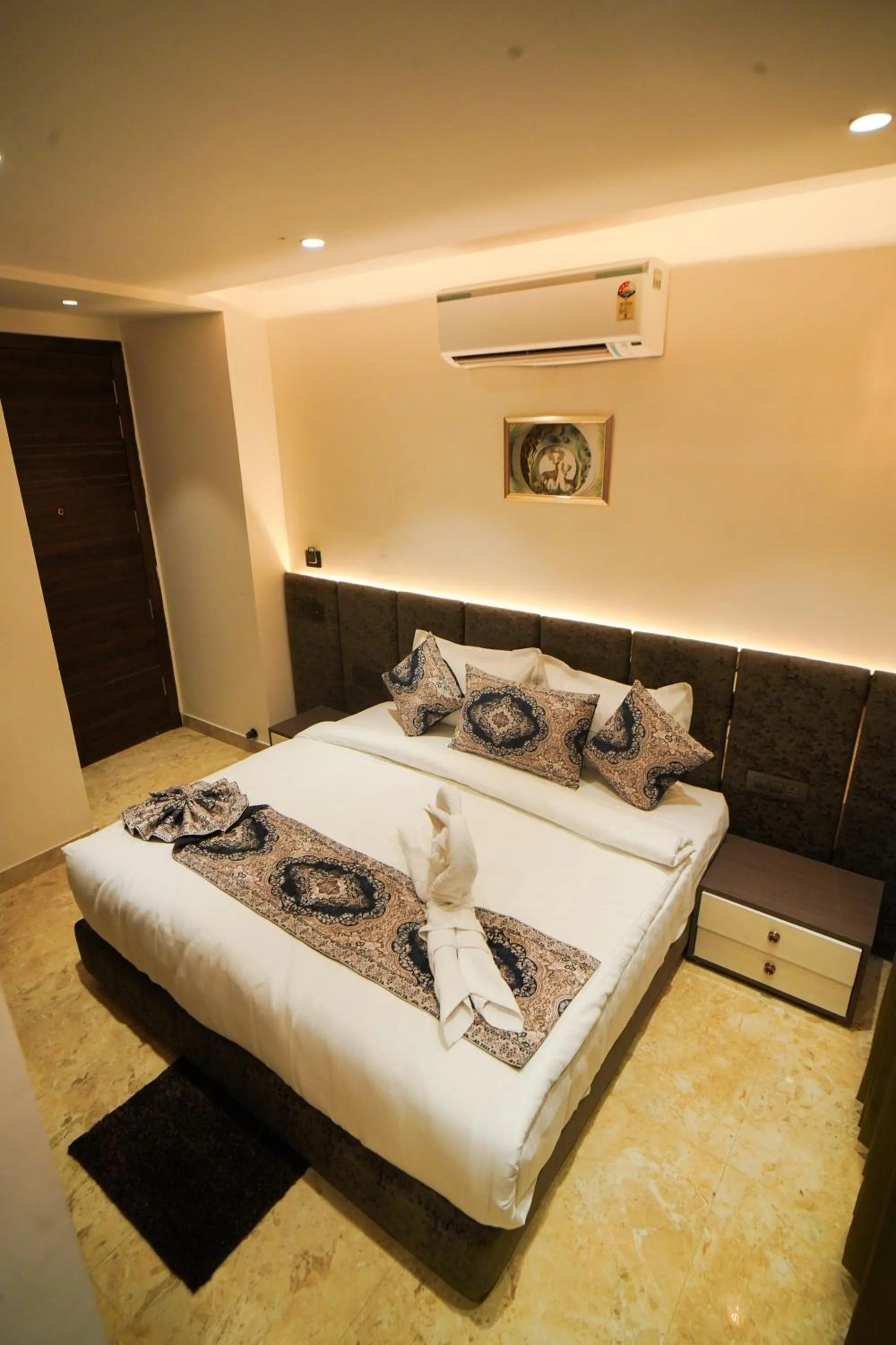 Bed in Hotel Ammison Inn & Suites