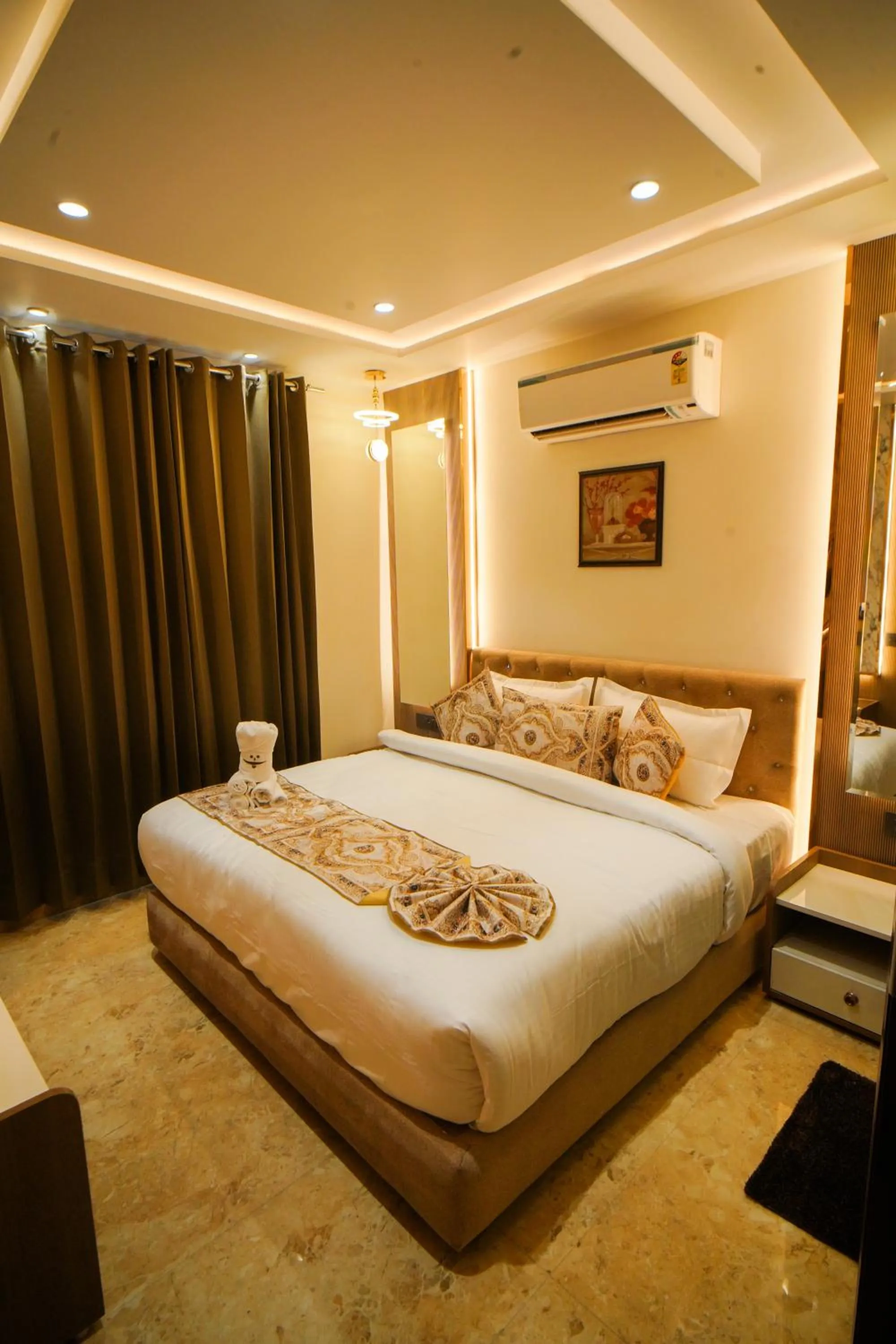 Bed in Hotel Ammison Inn & Suites