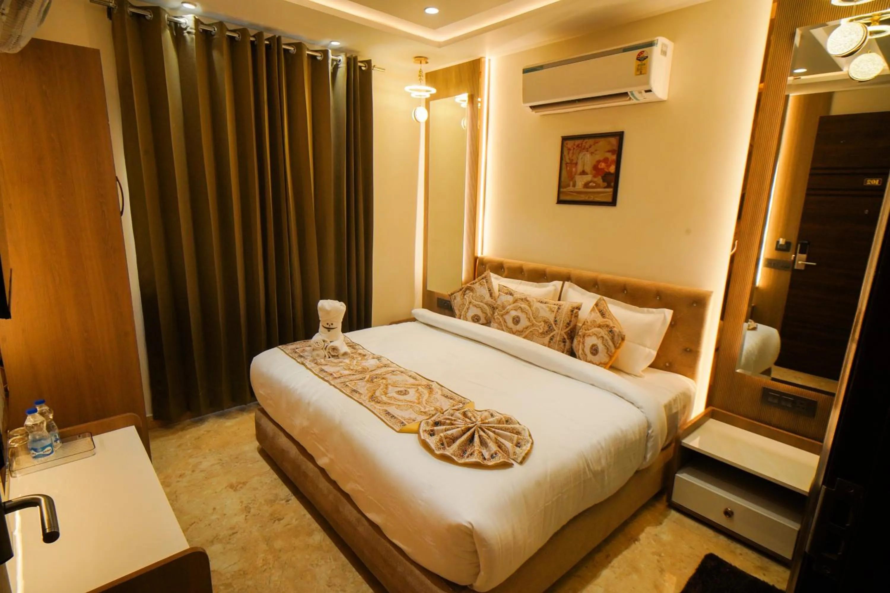 Bed in Hotel Ammison Inn & Suites