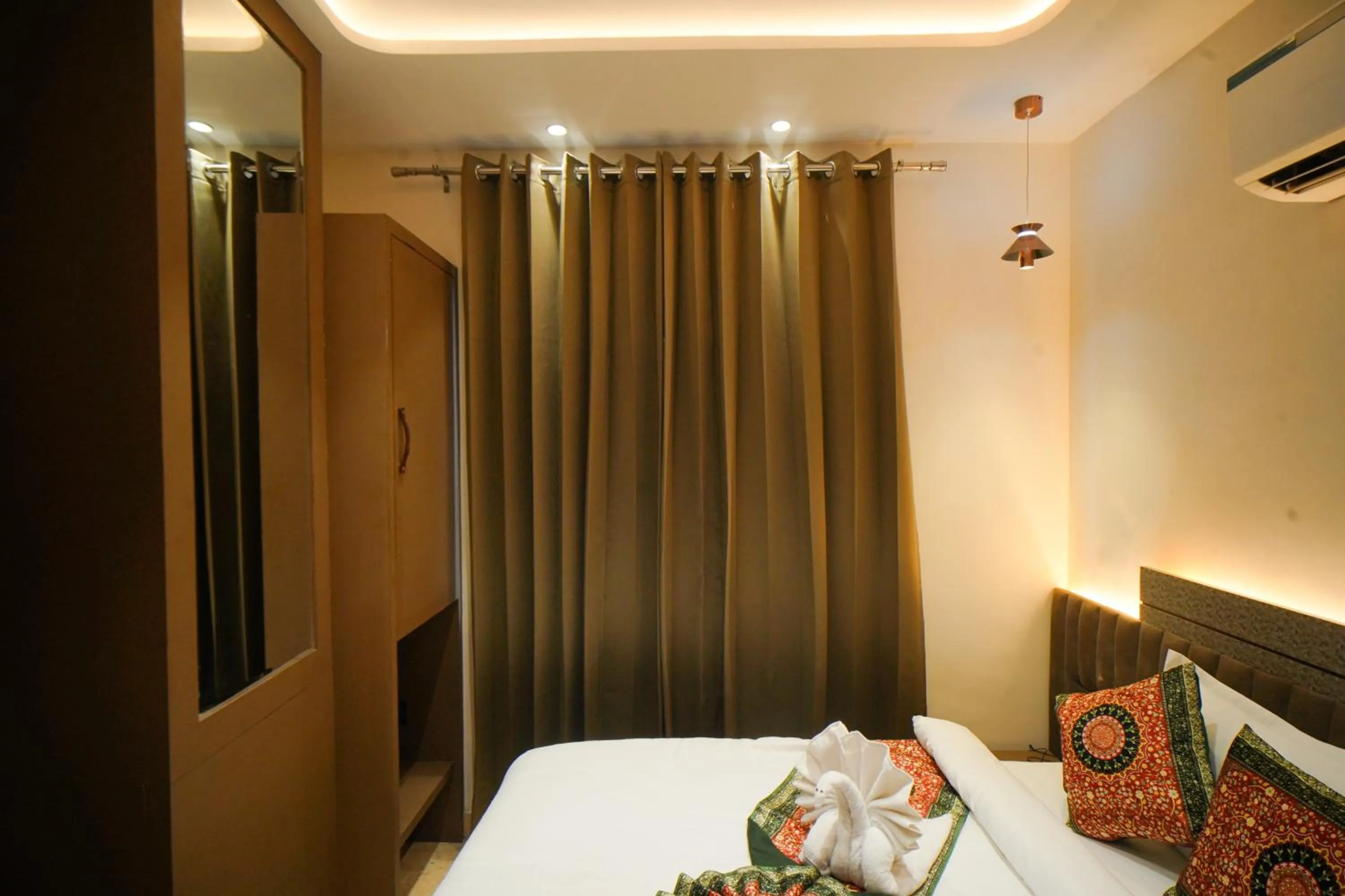 Bed in Hotel Ammison Inn & Suites