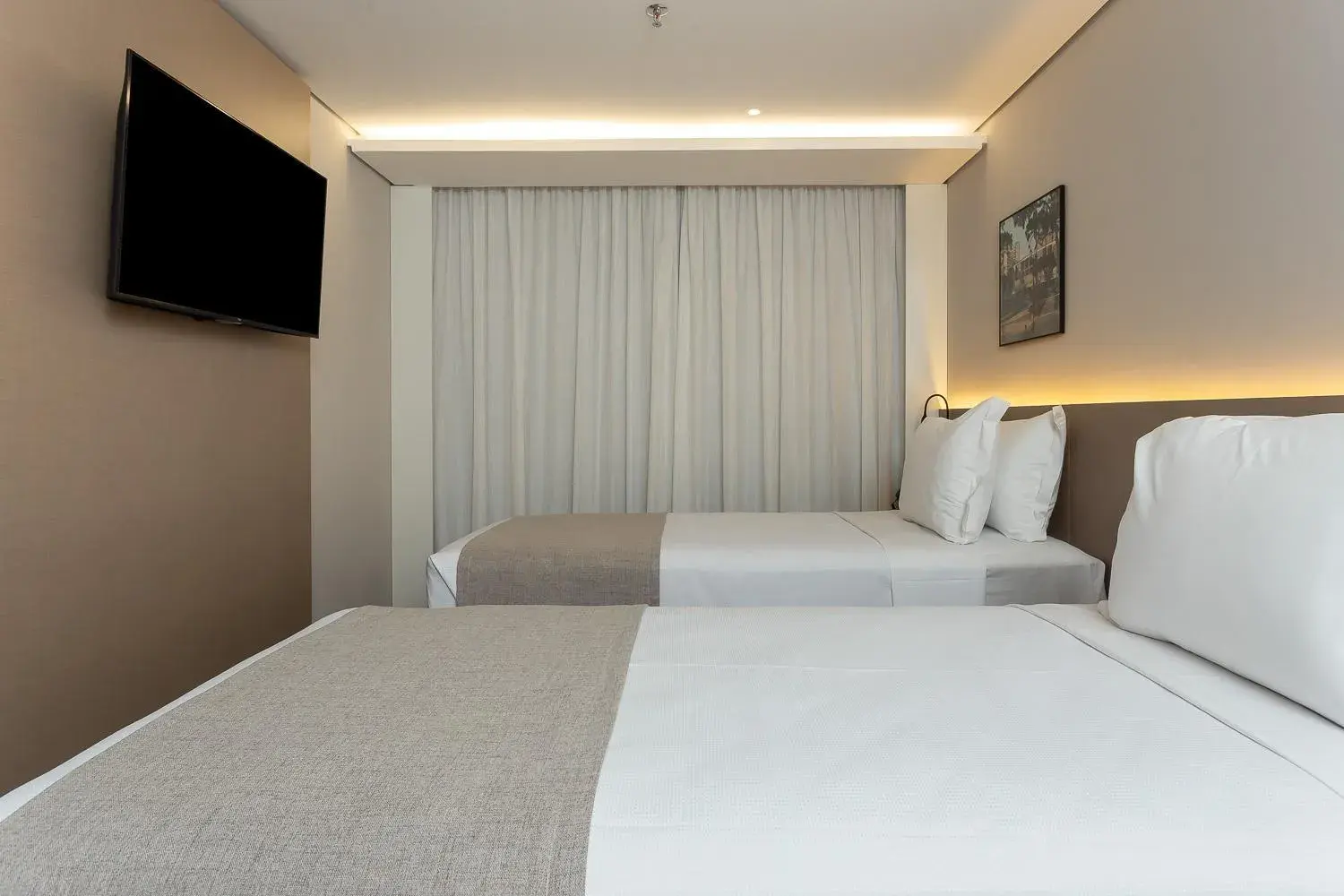 Deluxe Family Room in Hotel Roochelle Convention By Nobile Deluxe Family Room in Hotel Roochelle Convention By Nobile
