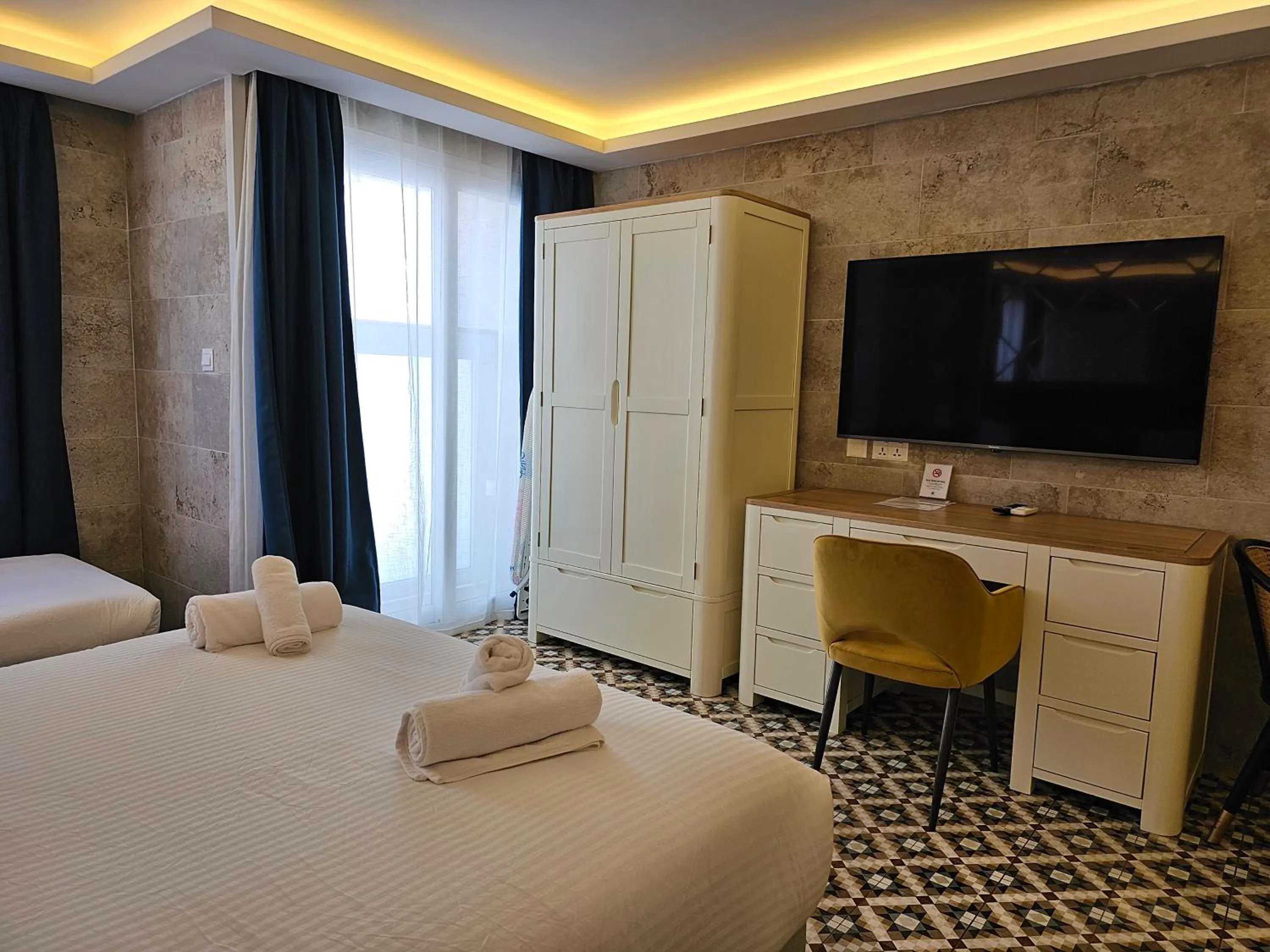 Bed in Balcony Hotel