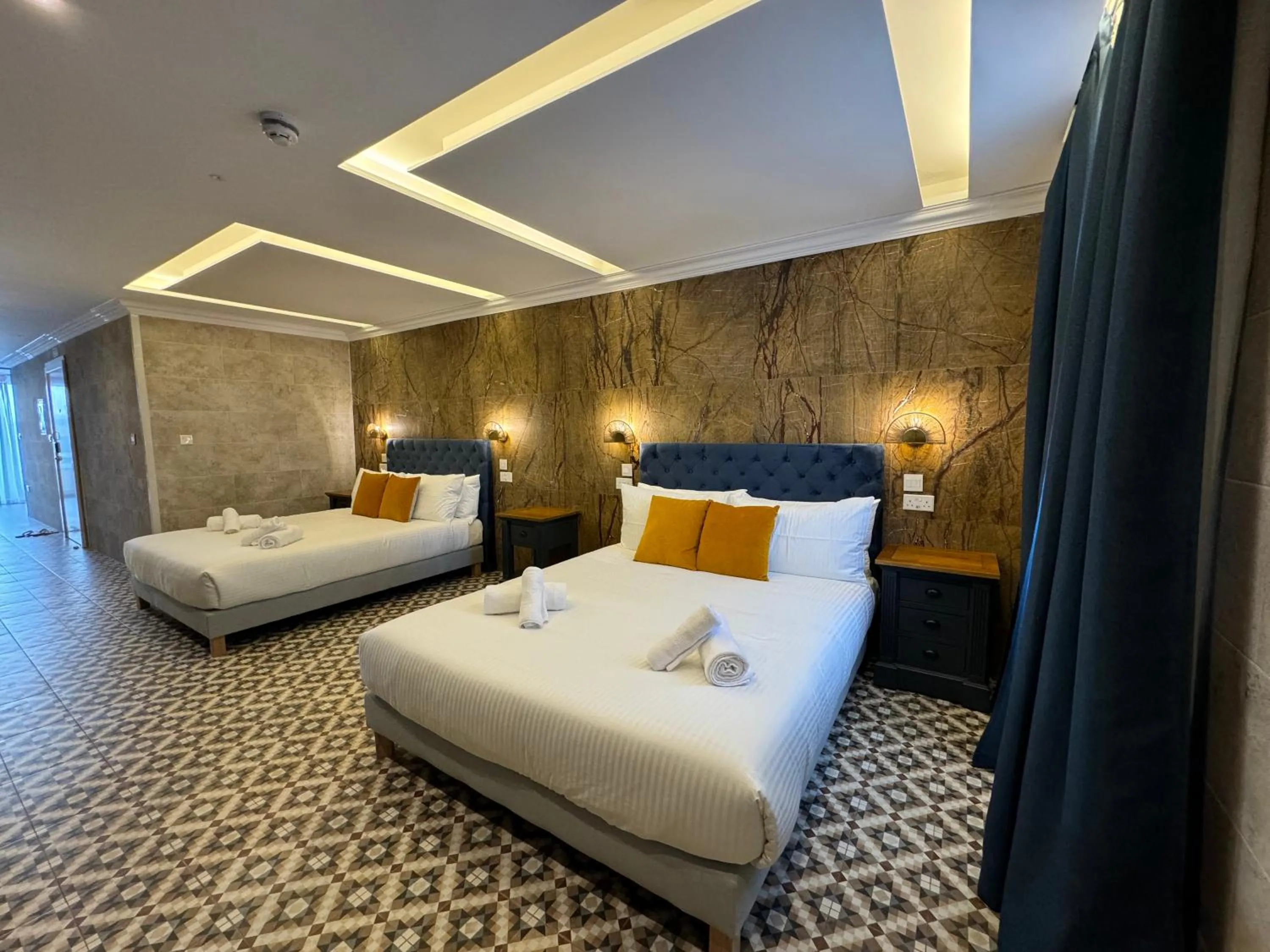 Bed in Balcony Hotel