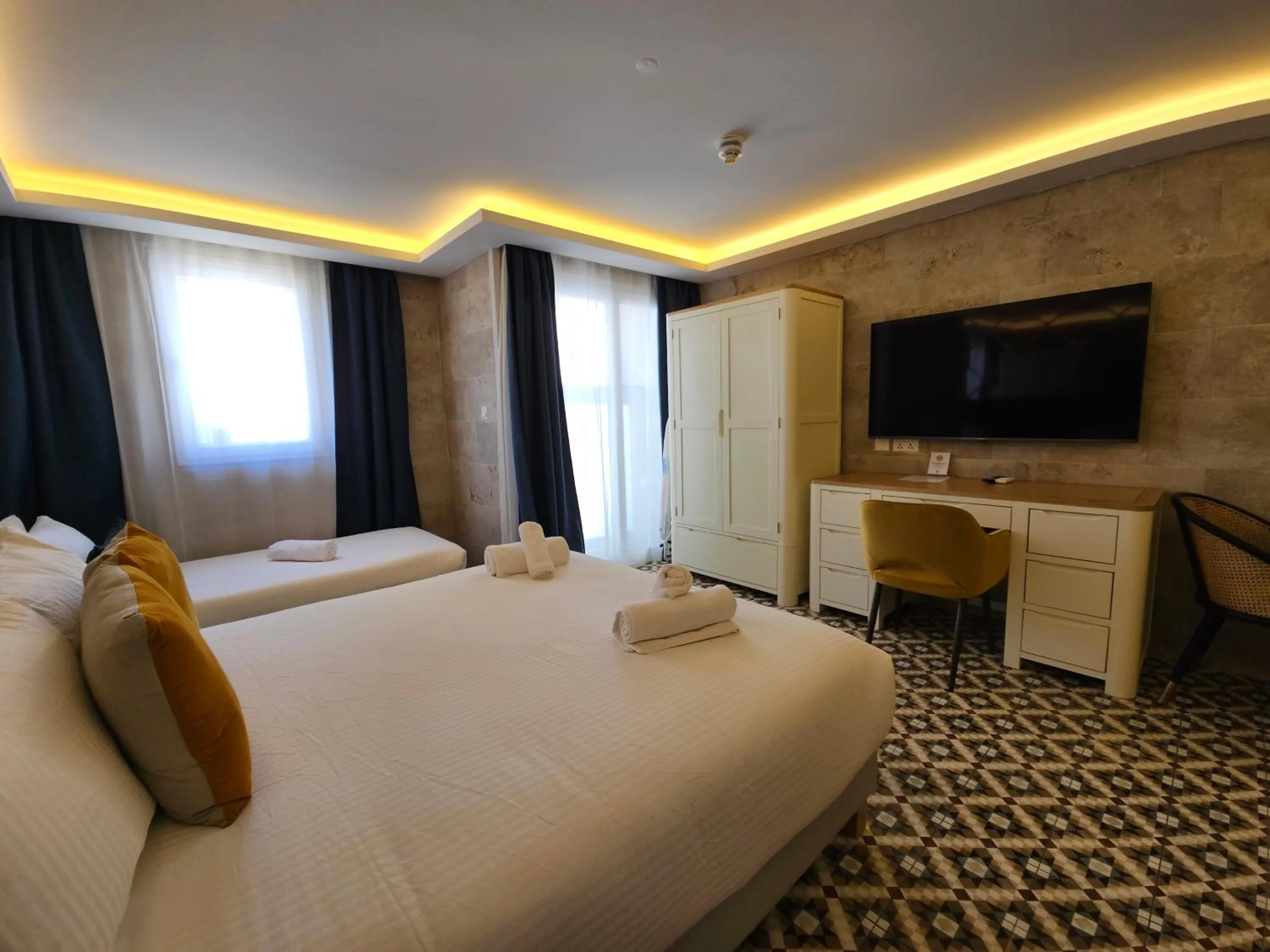 Bed in Balcony Hotel