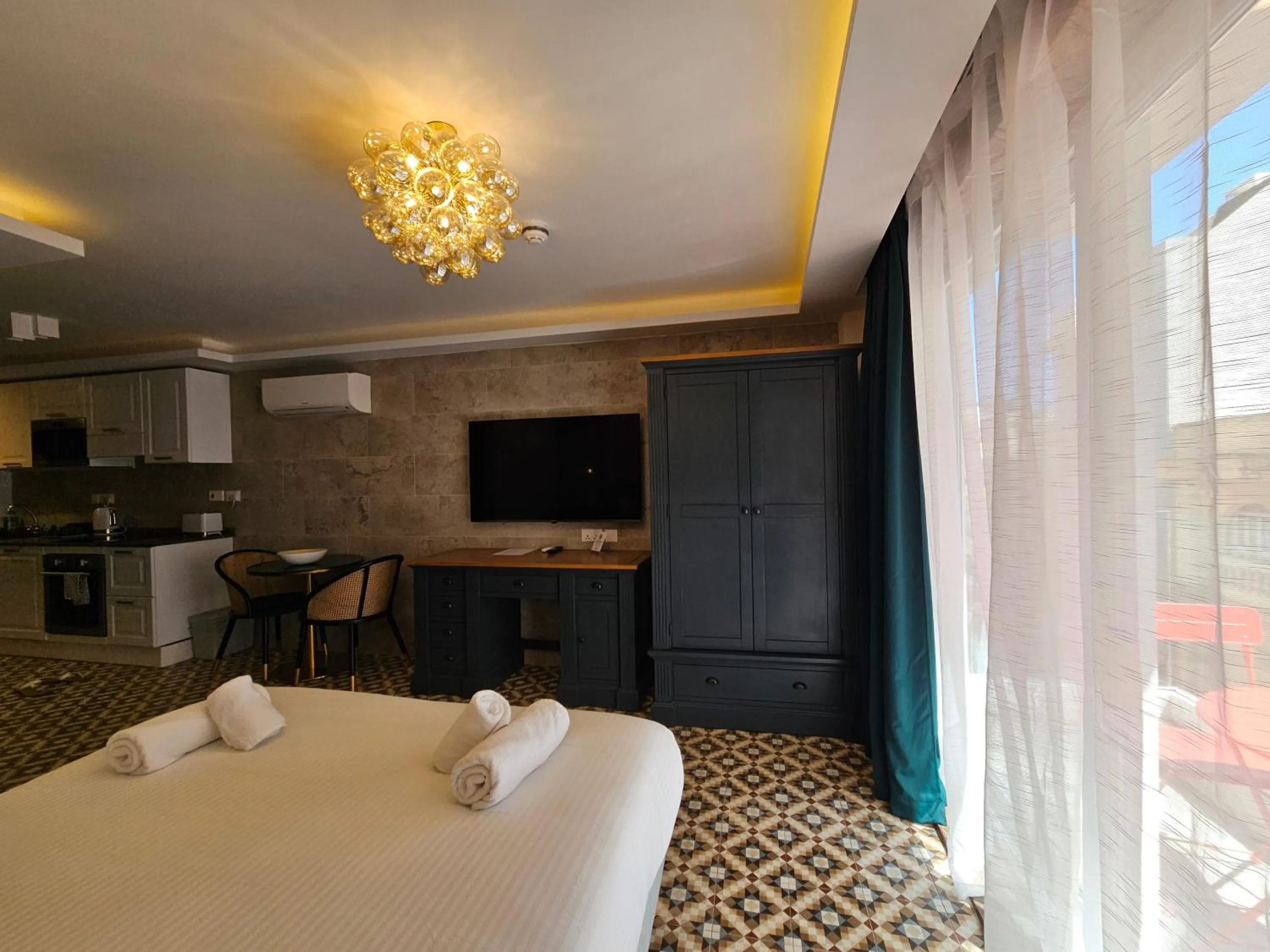 Bed in Balcony Hotel