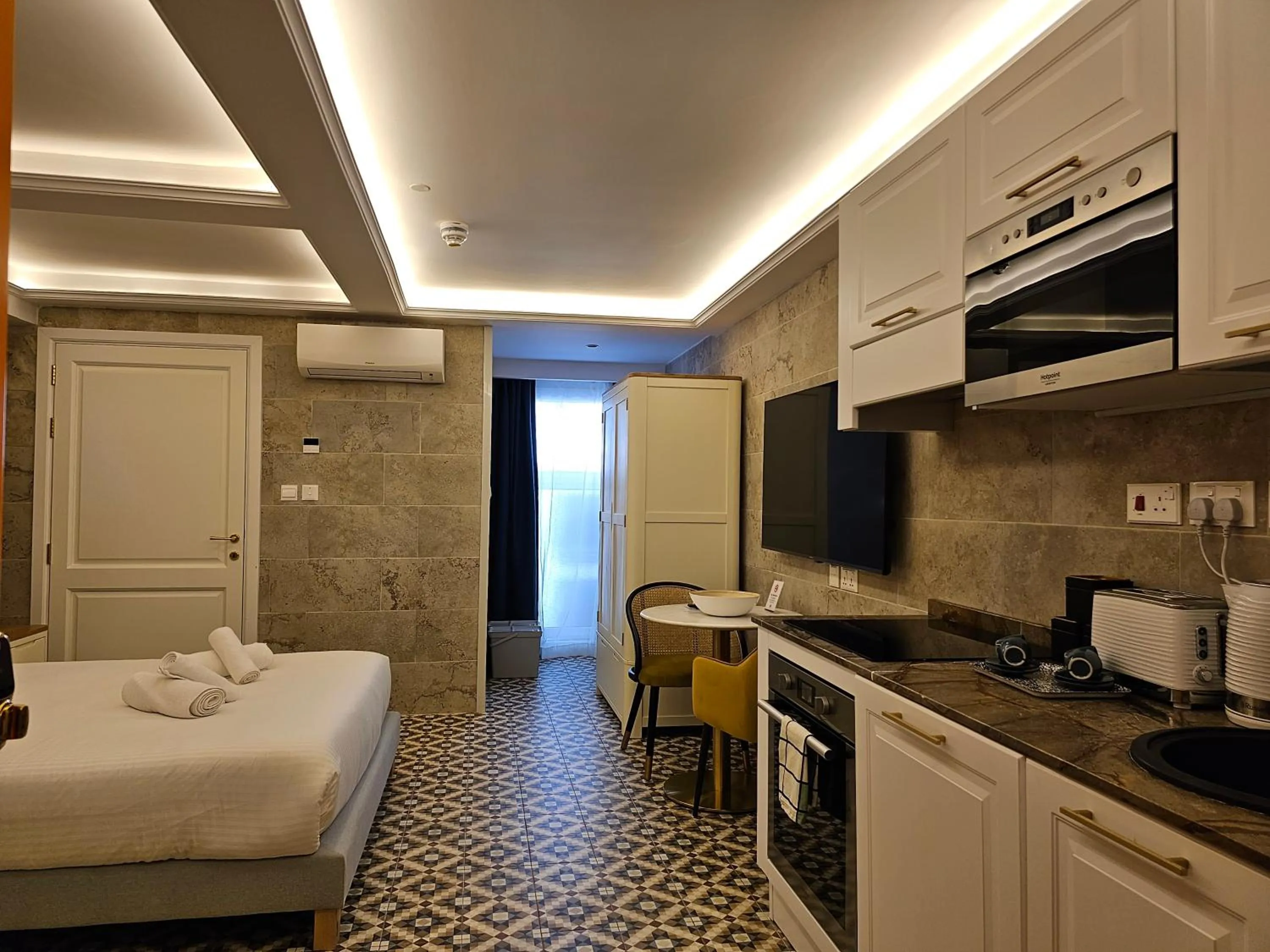 Bed in Balcony Hotel