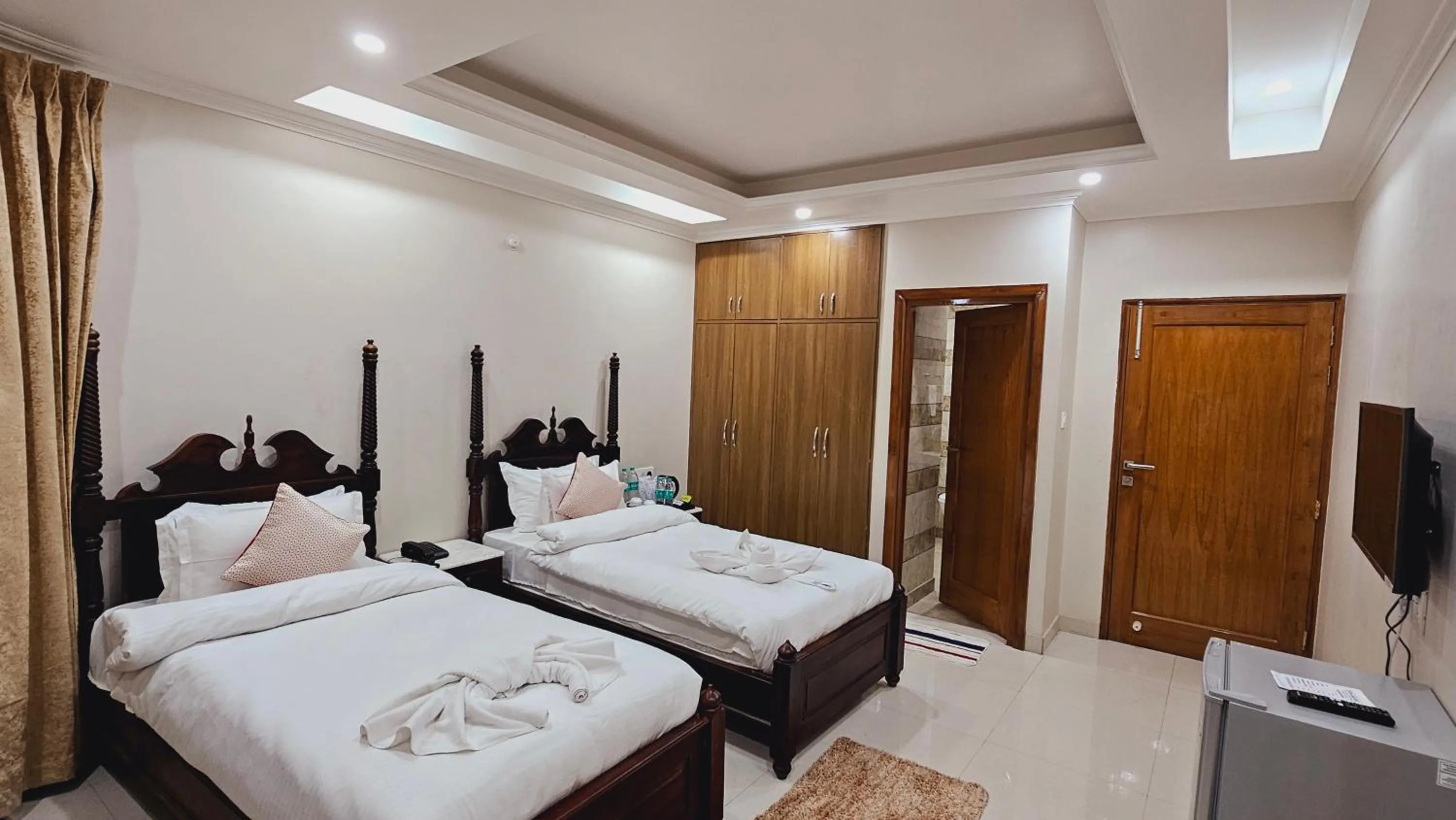 Bed in Hydrangea Heights by PTW Hotels