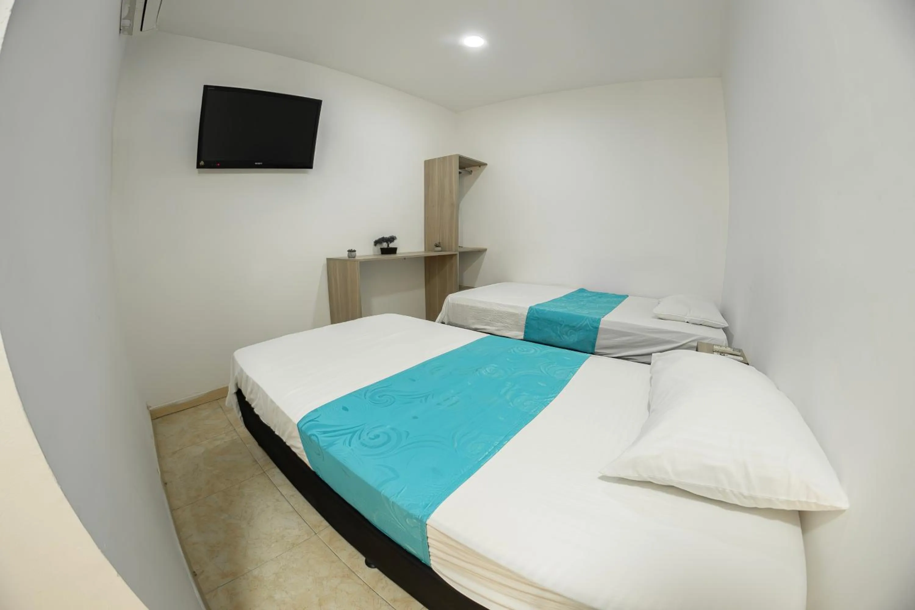 Bed in Hotel Santander Plaza