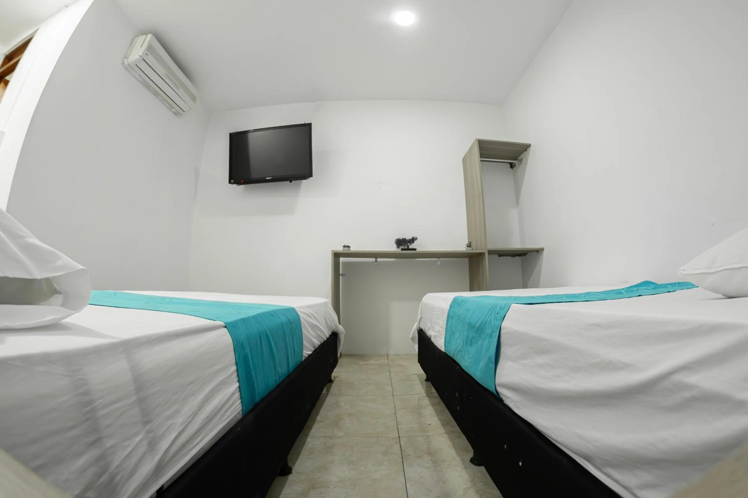 Bed in Hotel Santander Plaza