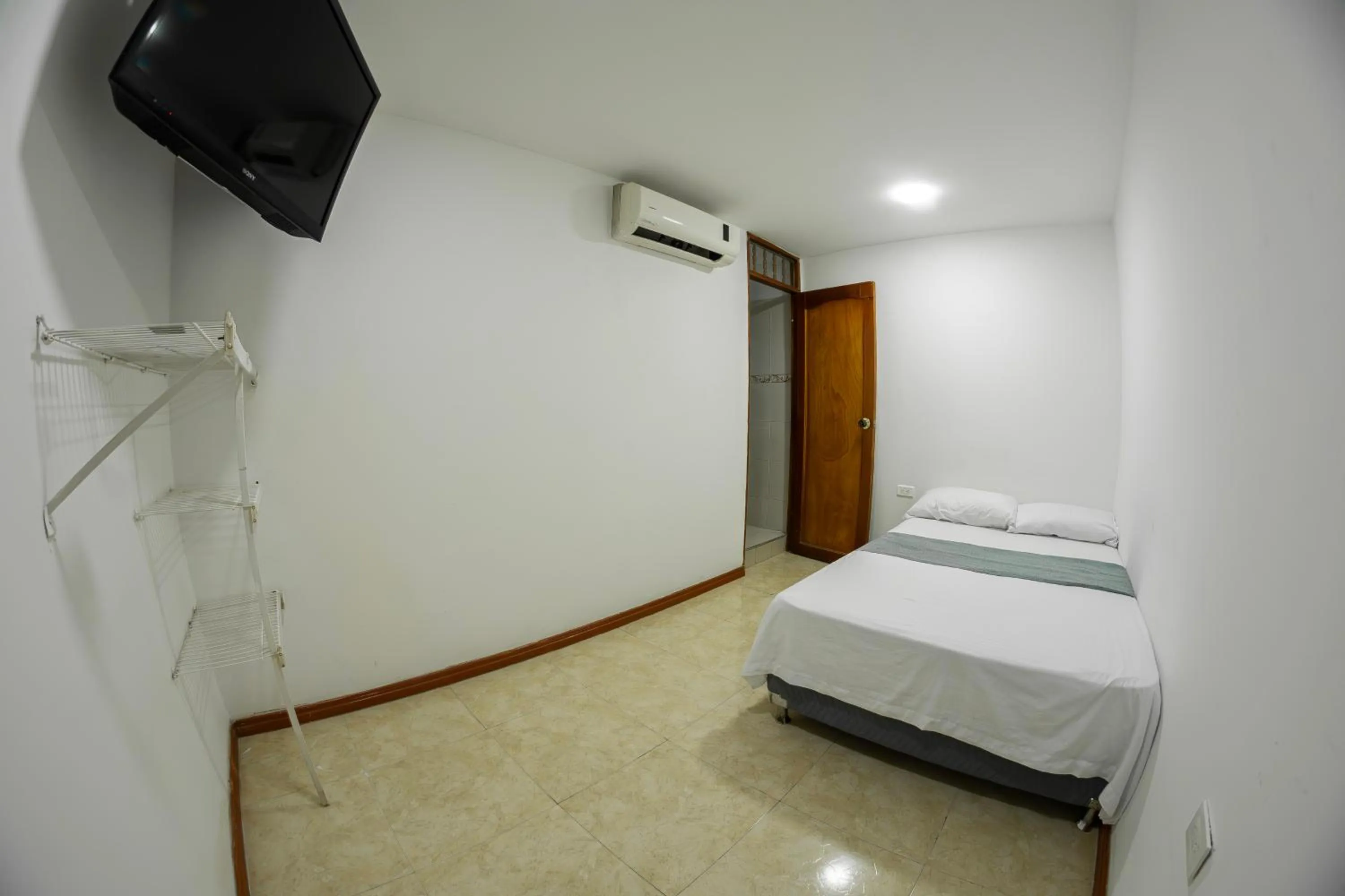 Bed in Hotel Santander Plaza