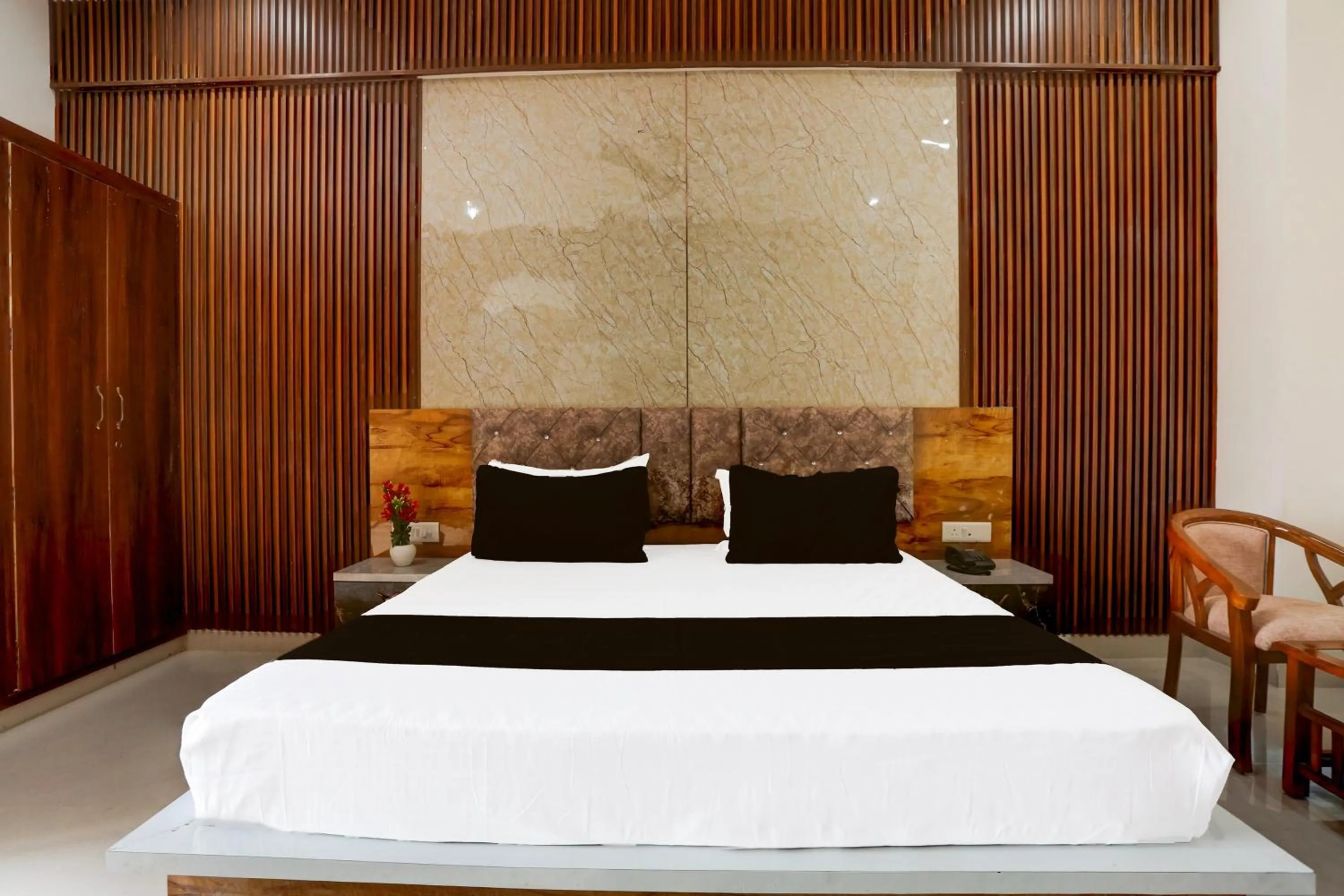 Bedroom in Hotel O BGM