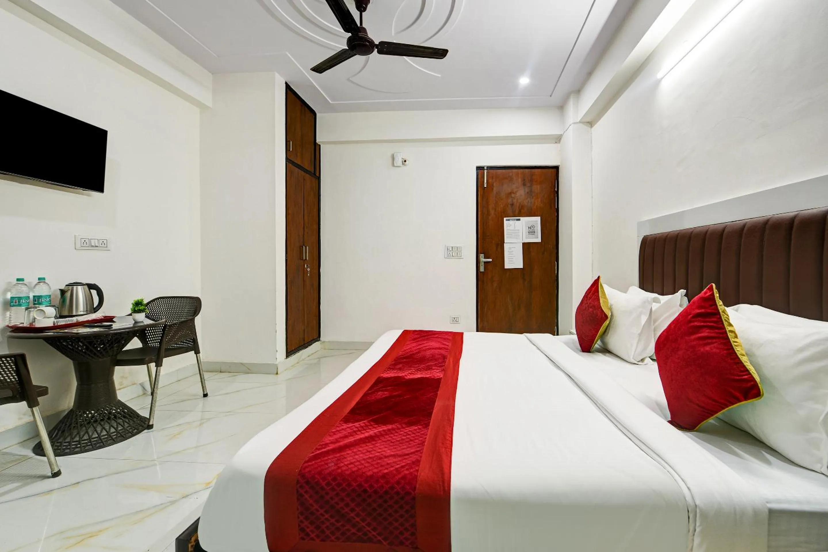 Bed in Hotel Krishna Tower