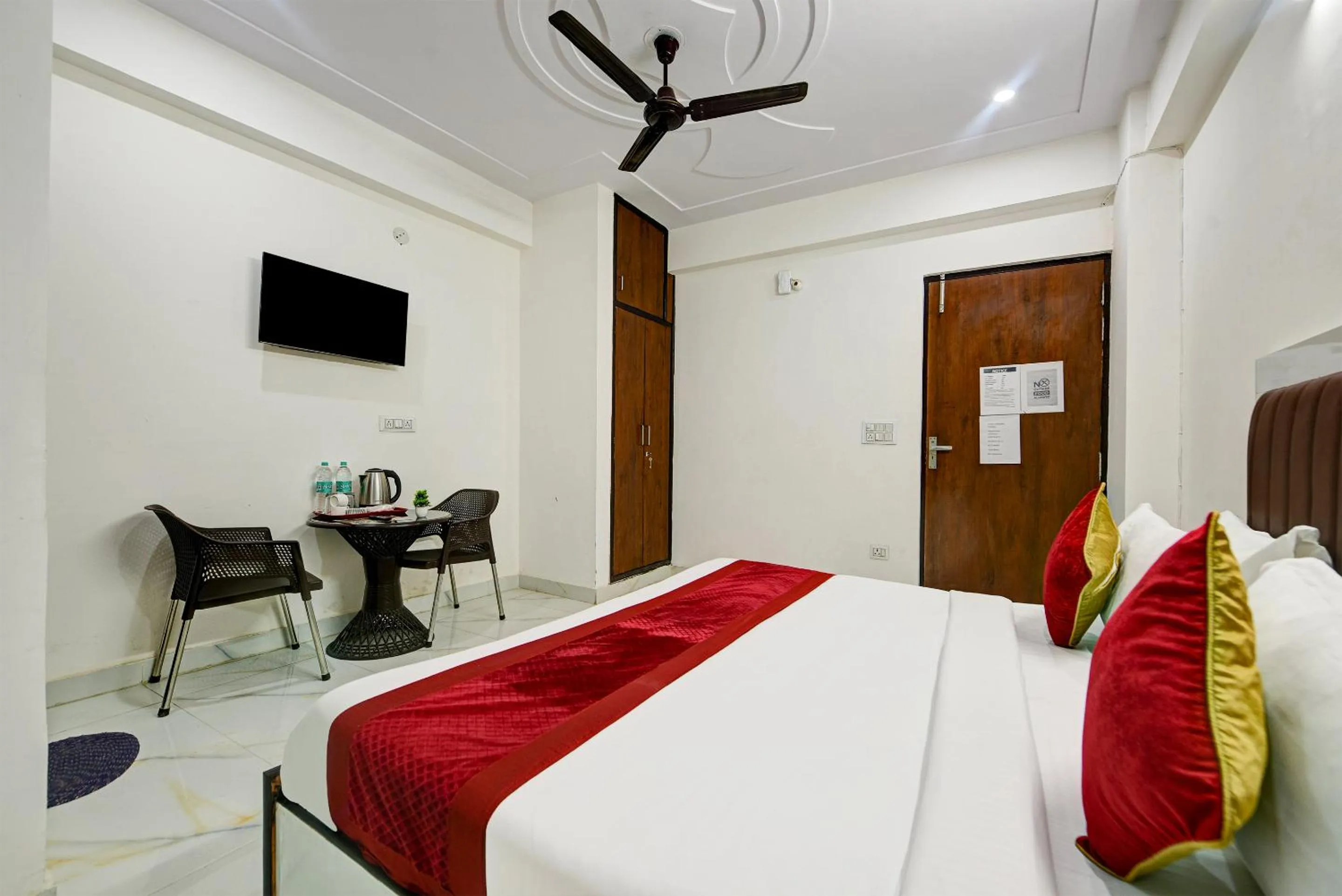 Bed in Hotel Krishna Tower