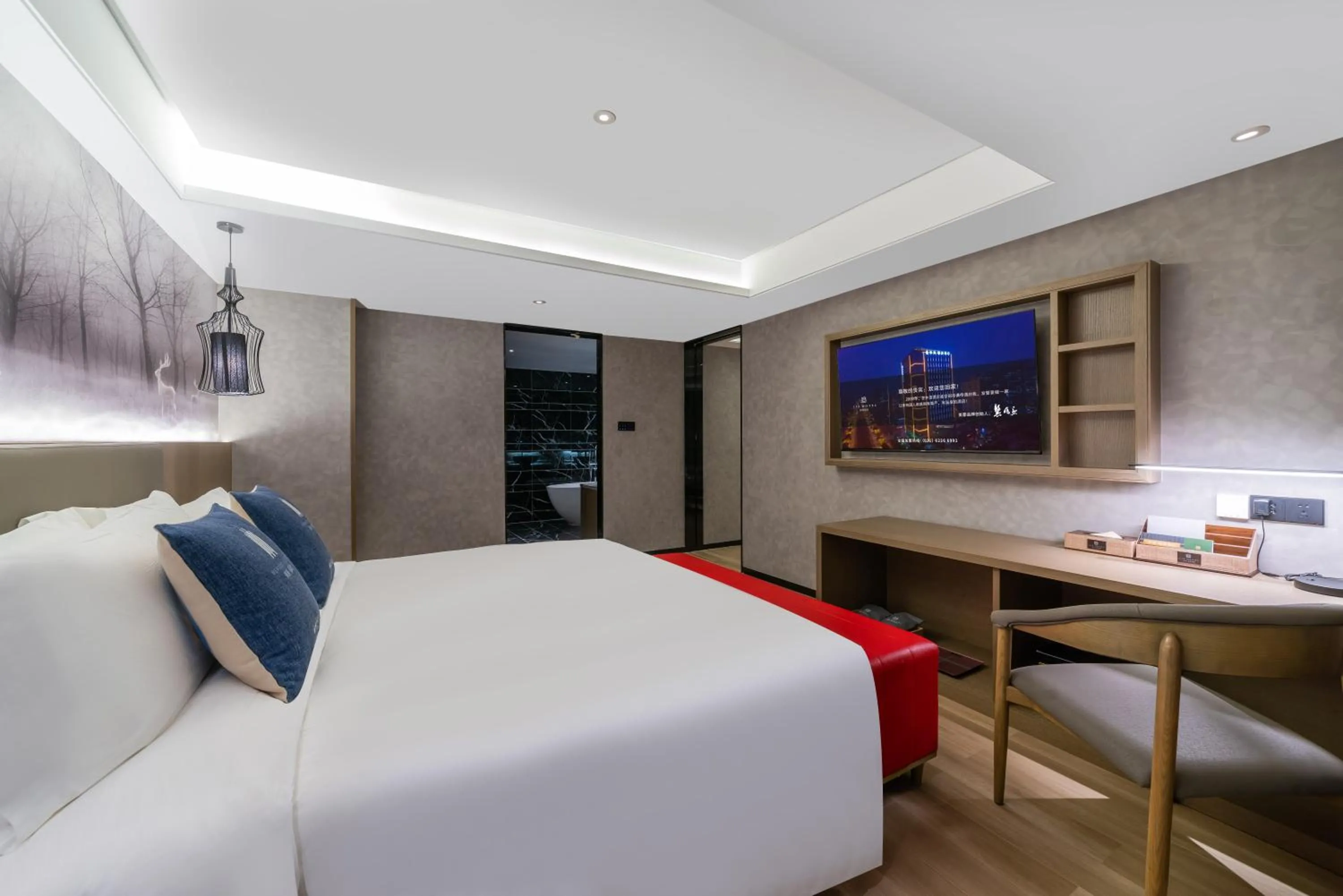 Bed in LIZ International Hotel Guangzhou Olympic Sports Center