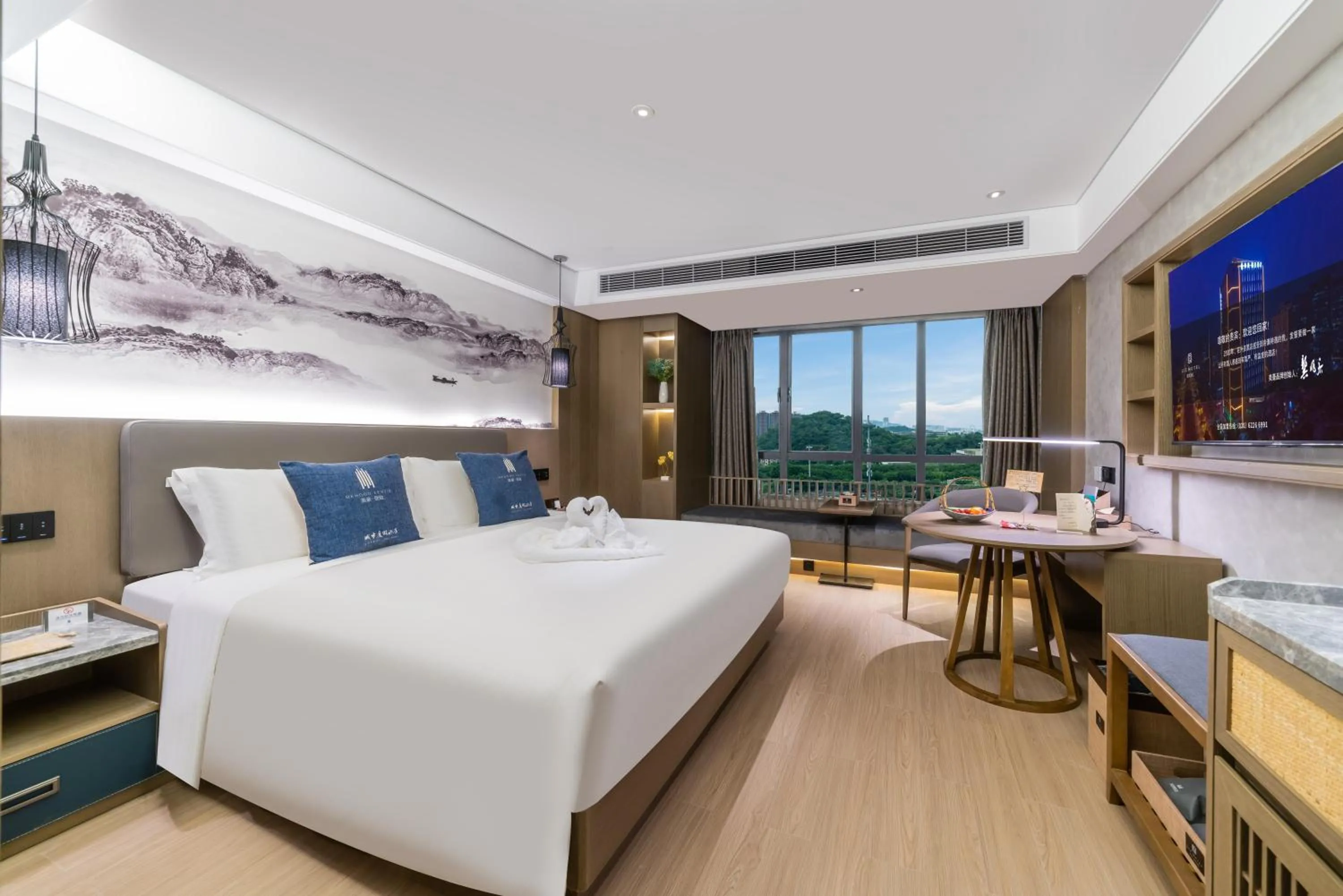 Bed in LIZ International Hotel Guangzhou Olympic Sports Center