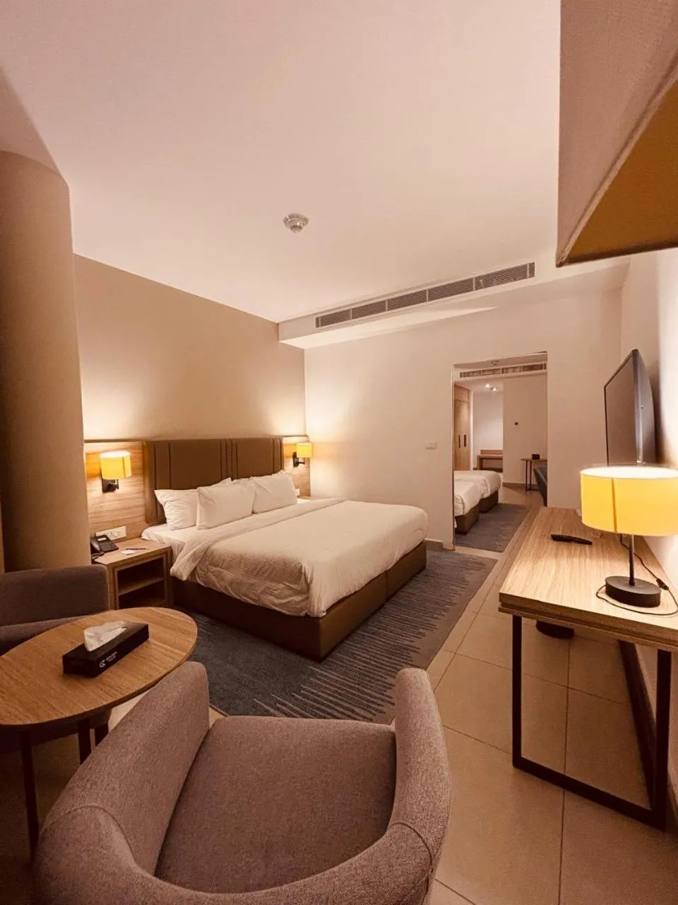 Bed in Golden Tulip Amman