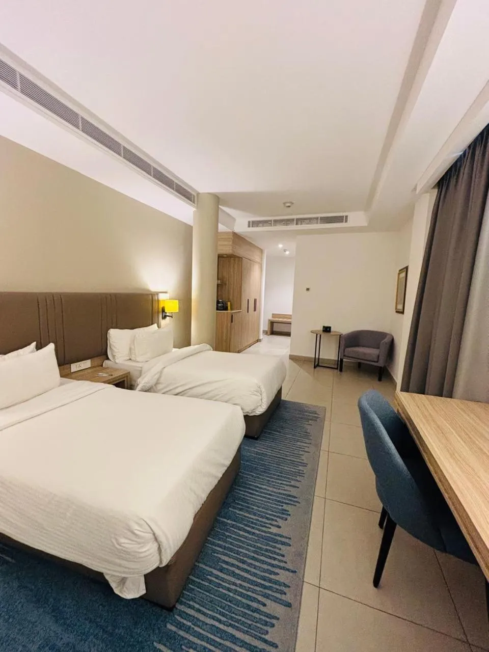 Bed in Golden Tulip Amman