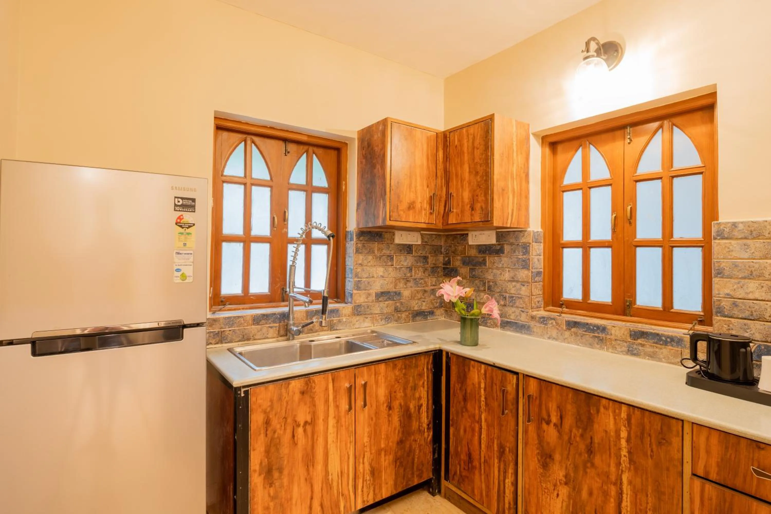 Kitchen or kitchenette in Emperor Ozran by Alaya Stays