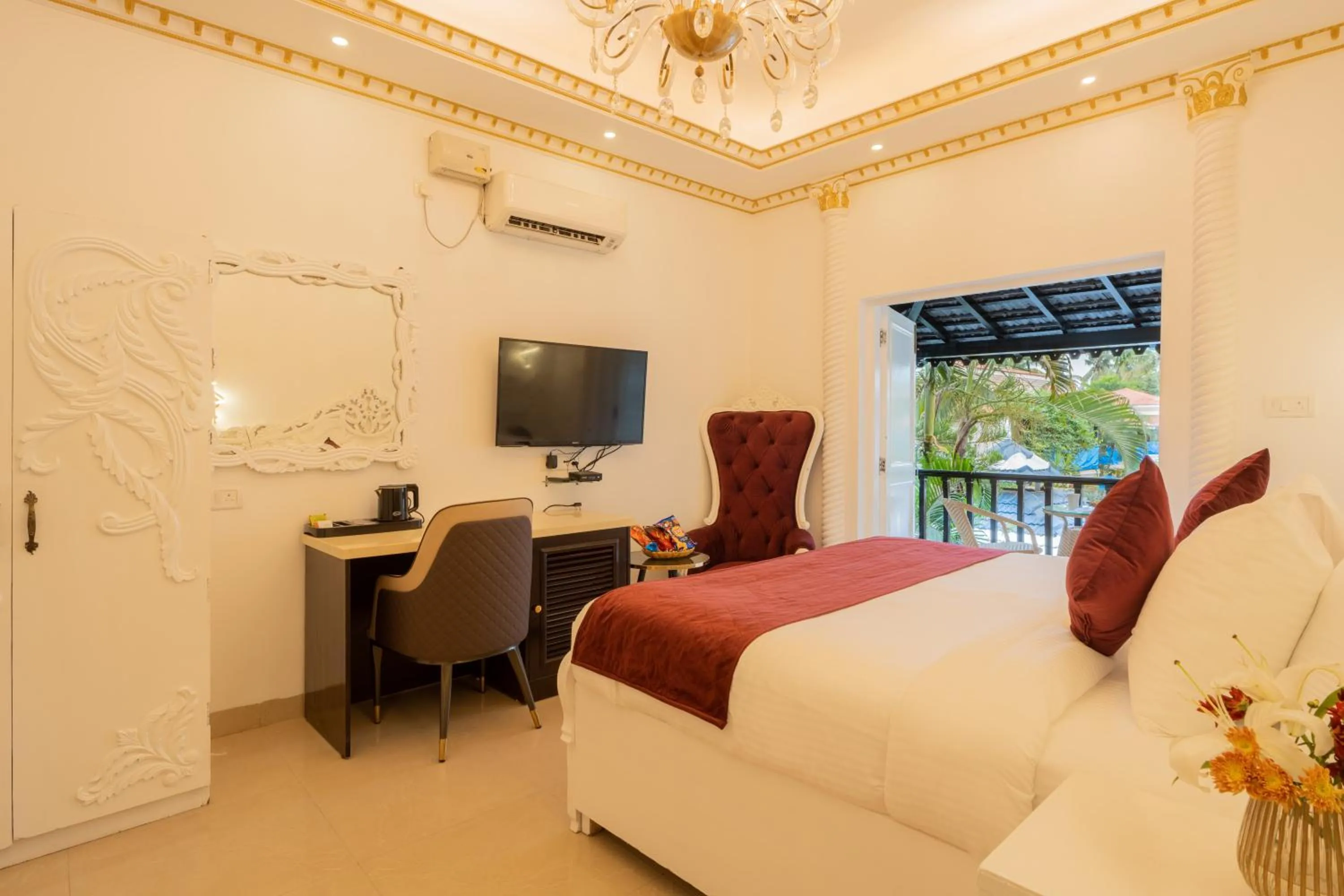 Communal lounge/ TV room, Bed in Emperor Ozran by Alaya Stays