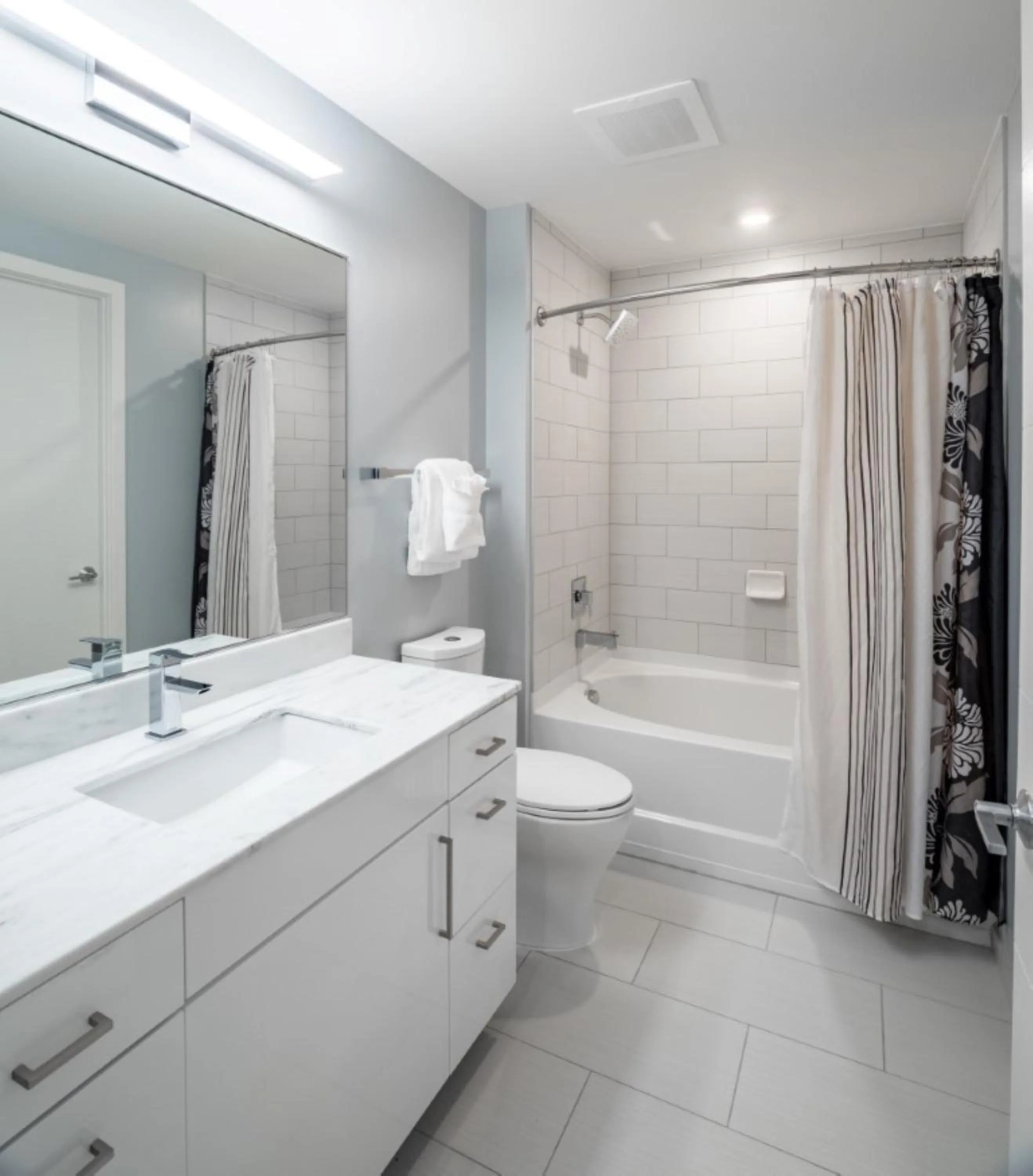 Shower in Global Luxury Suites Bethesda Chevy Chase
