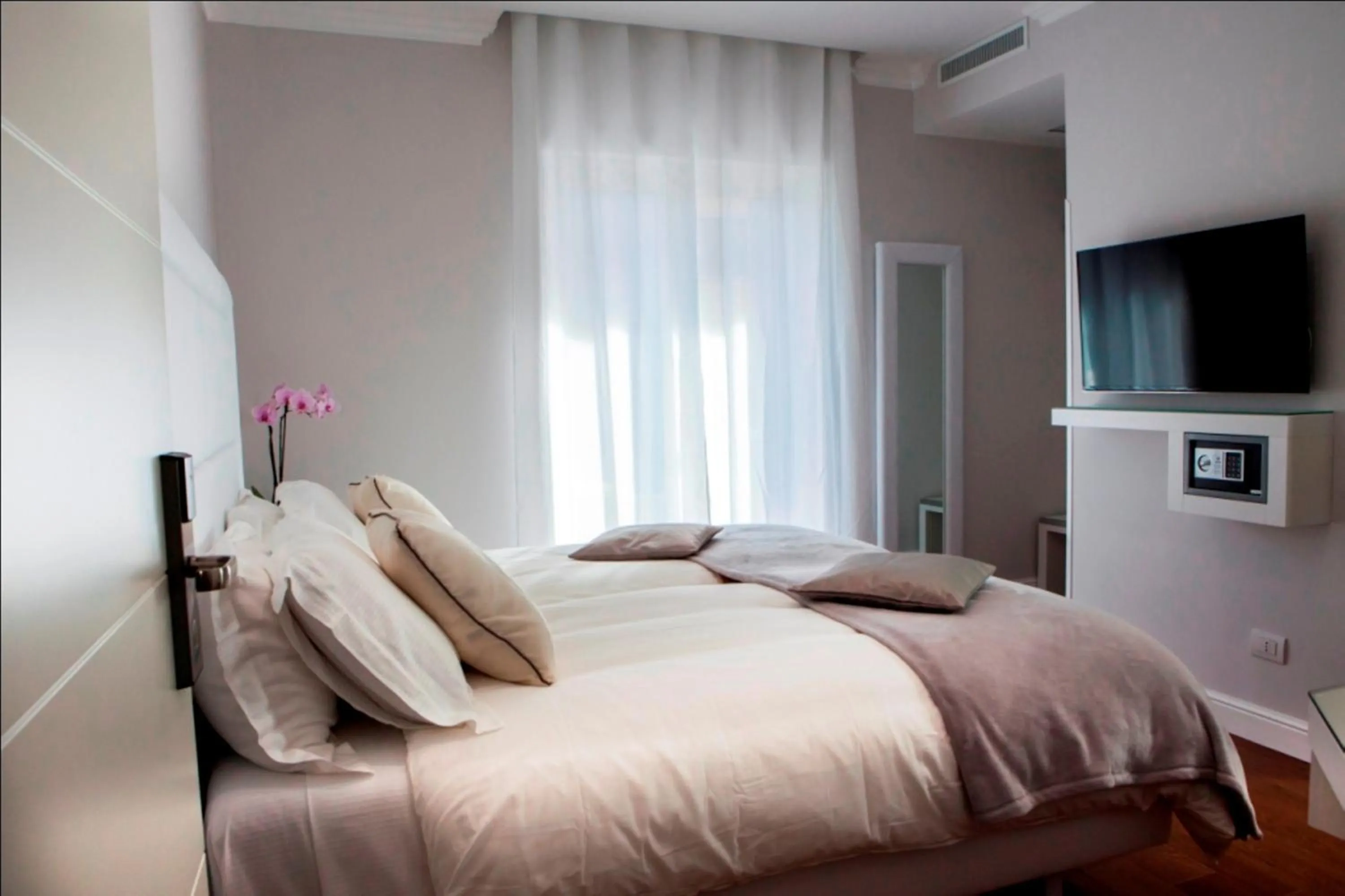 Bed in Bougainvillea Relais