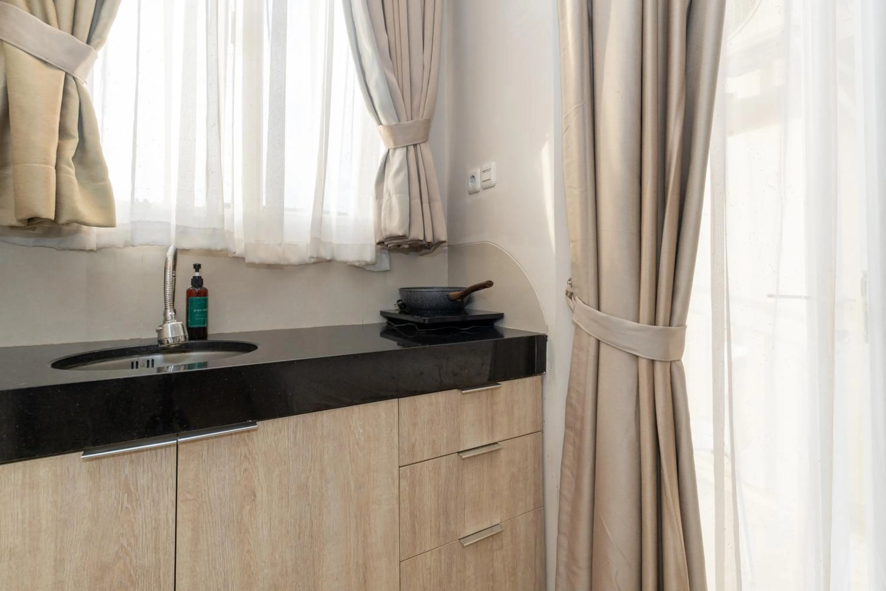 Kitchen or kitchenette in Bali Bustle Pararaton Coliving and Coworking Space