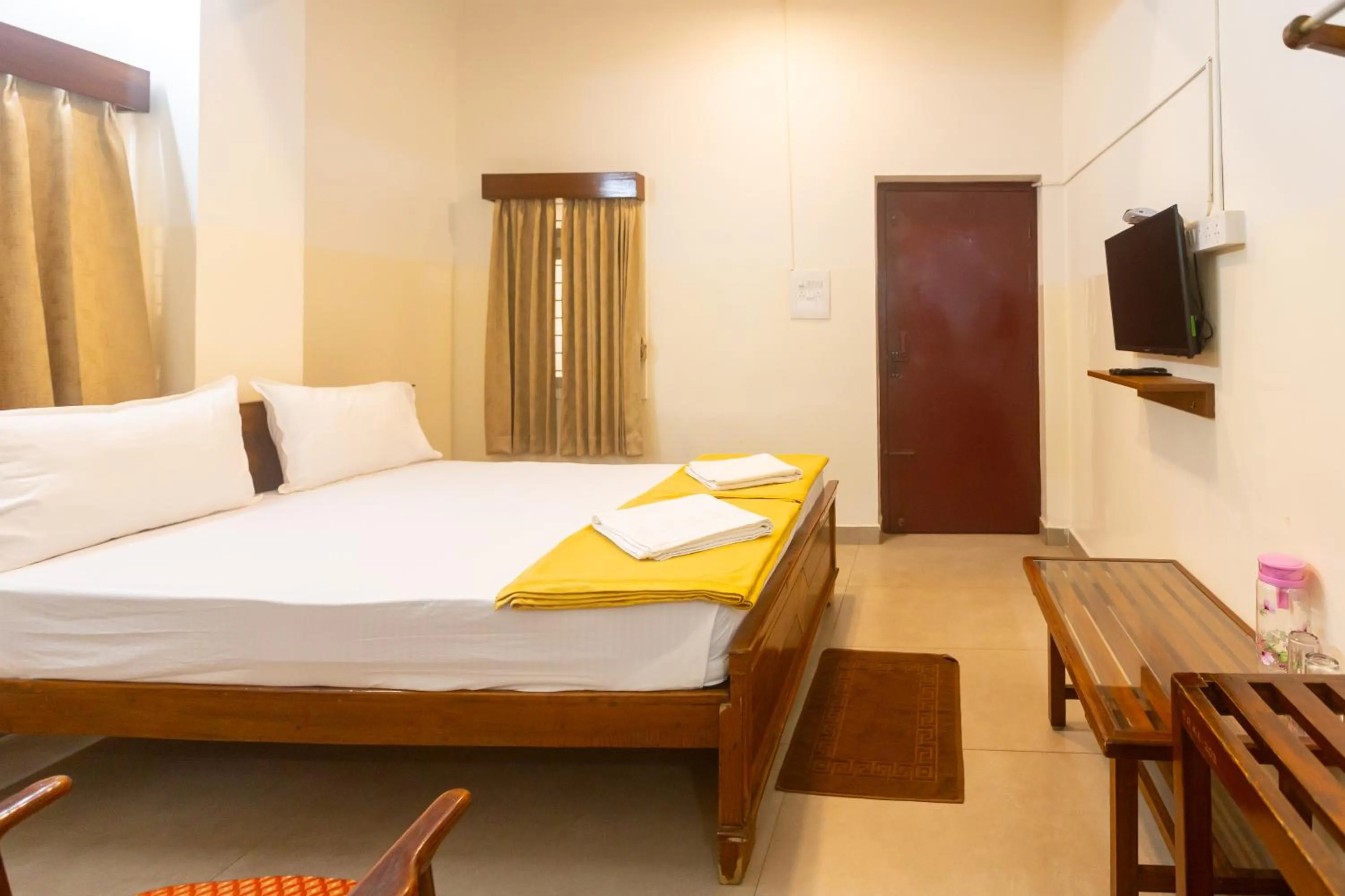 Bed in Sri Ramakrishna Hotel
