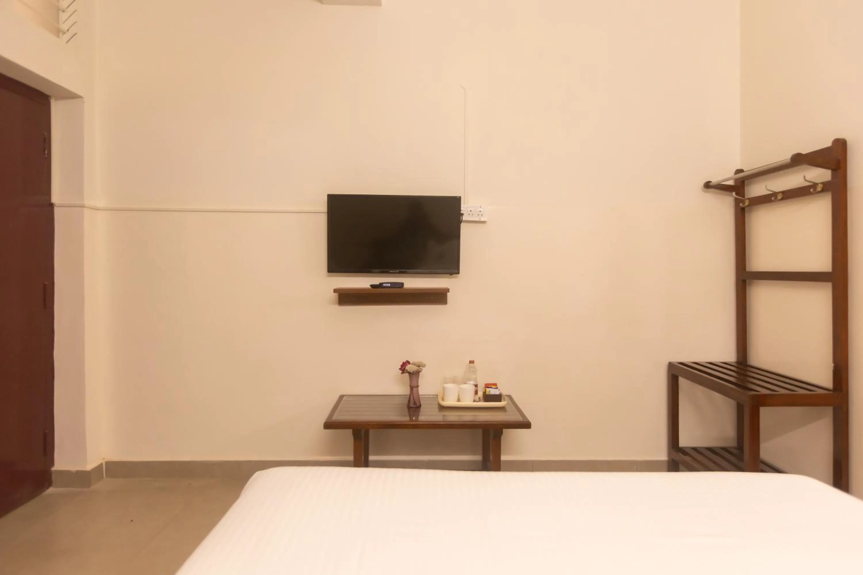 Bed in Sri Ramakrishna Hotel