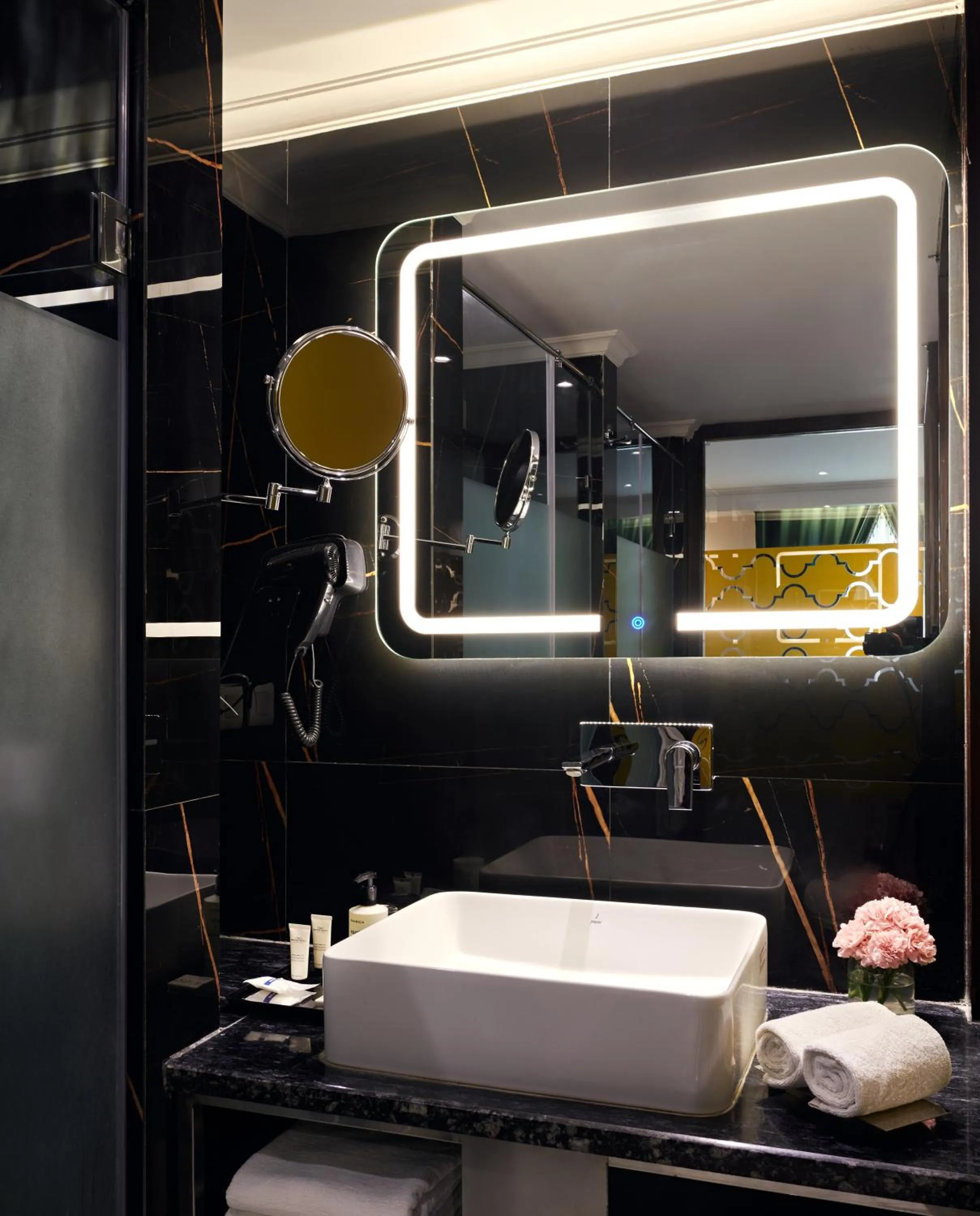 Bathroom in Deventure Sarovar Portico Patel Nagar