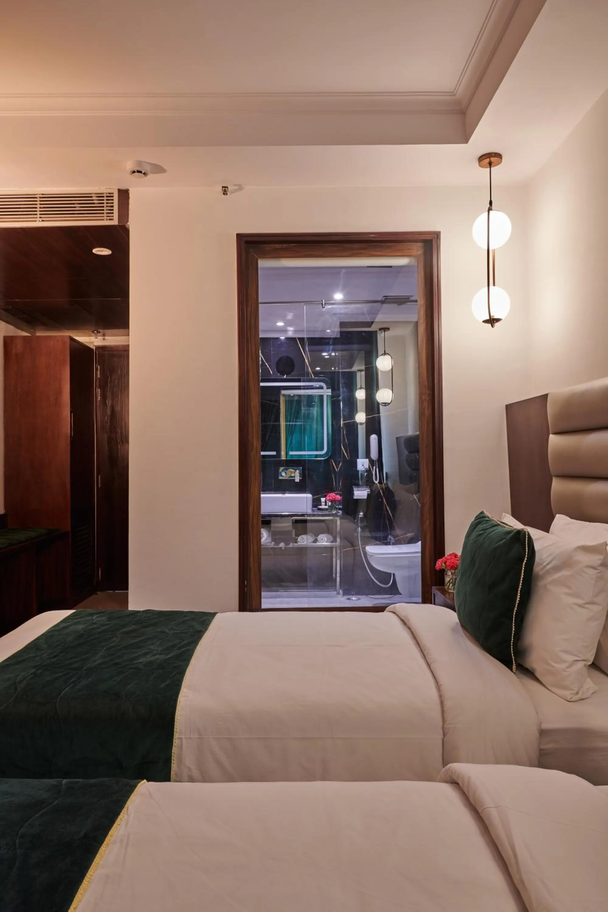 Bedroom, Bed in Deventure Sarovar Portico Patel Nagar