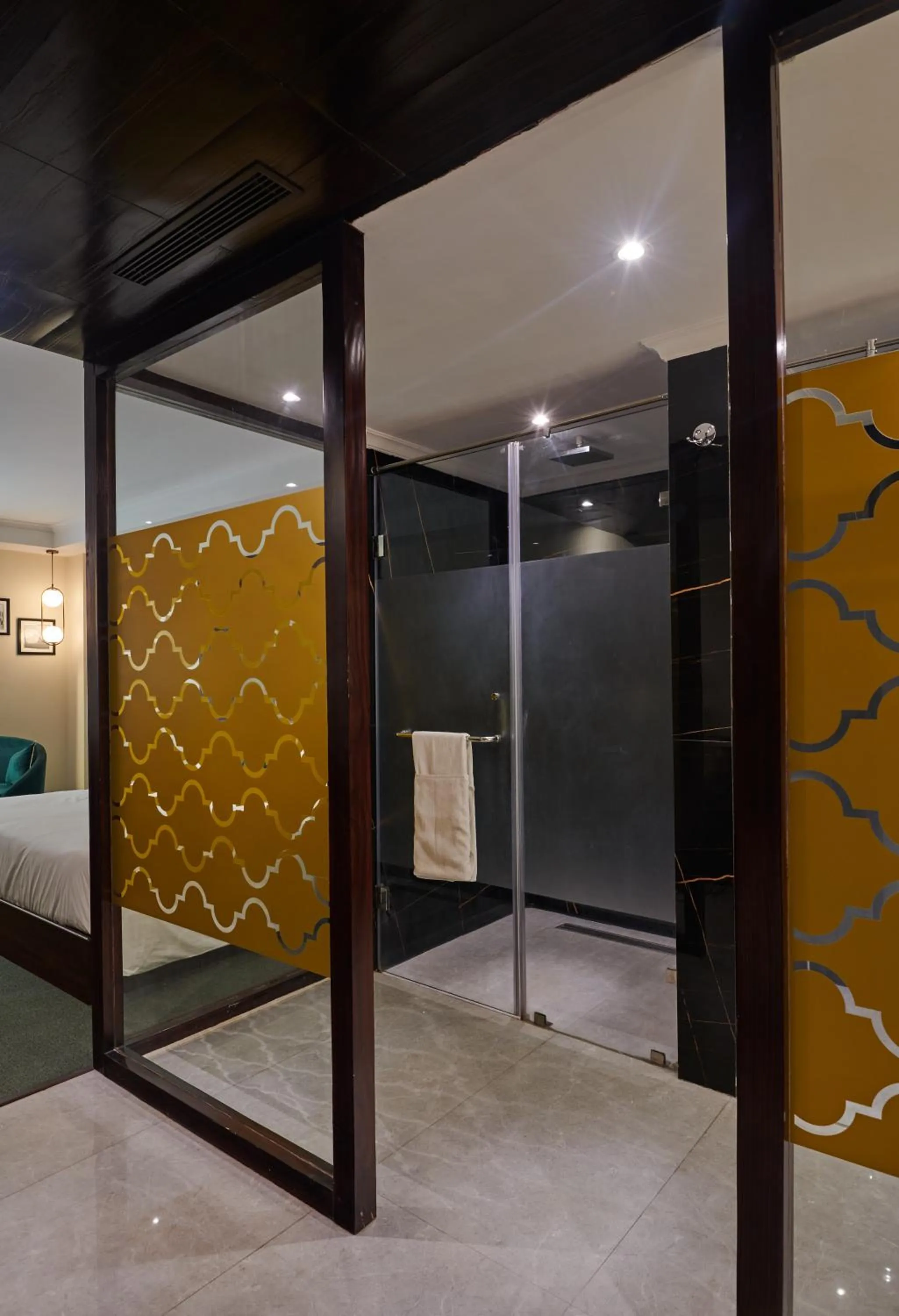 Bathroom in Deventure Sarovar Portico Patel Nagar