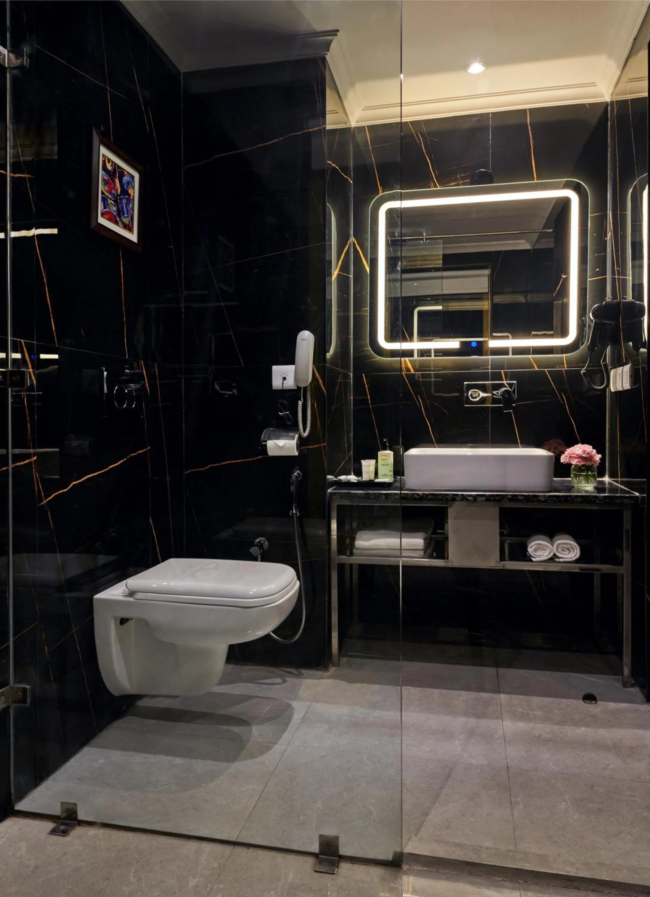 Bathroom in Deventure Sarovar Portico Patel Nagar