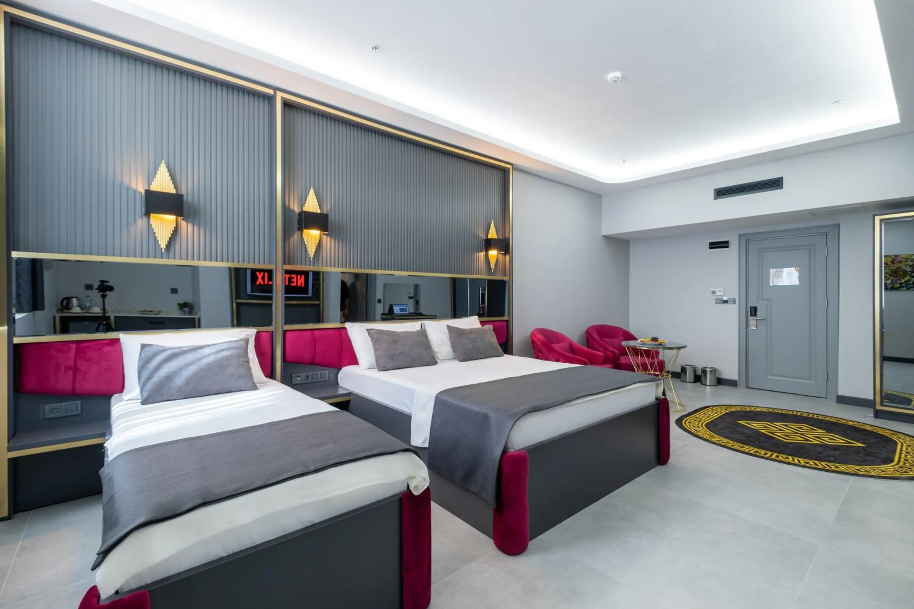 Bed in 216 Prestige Hotel