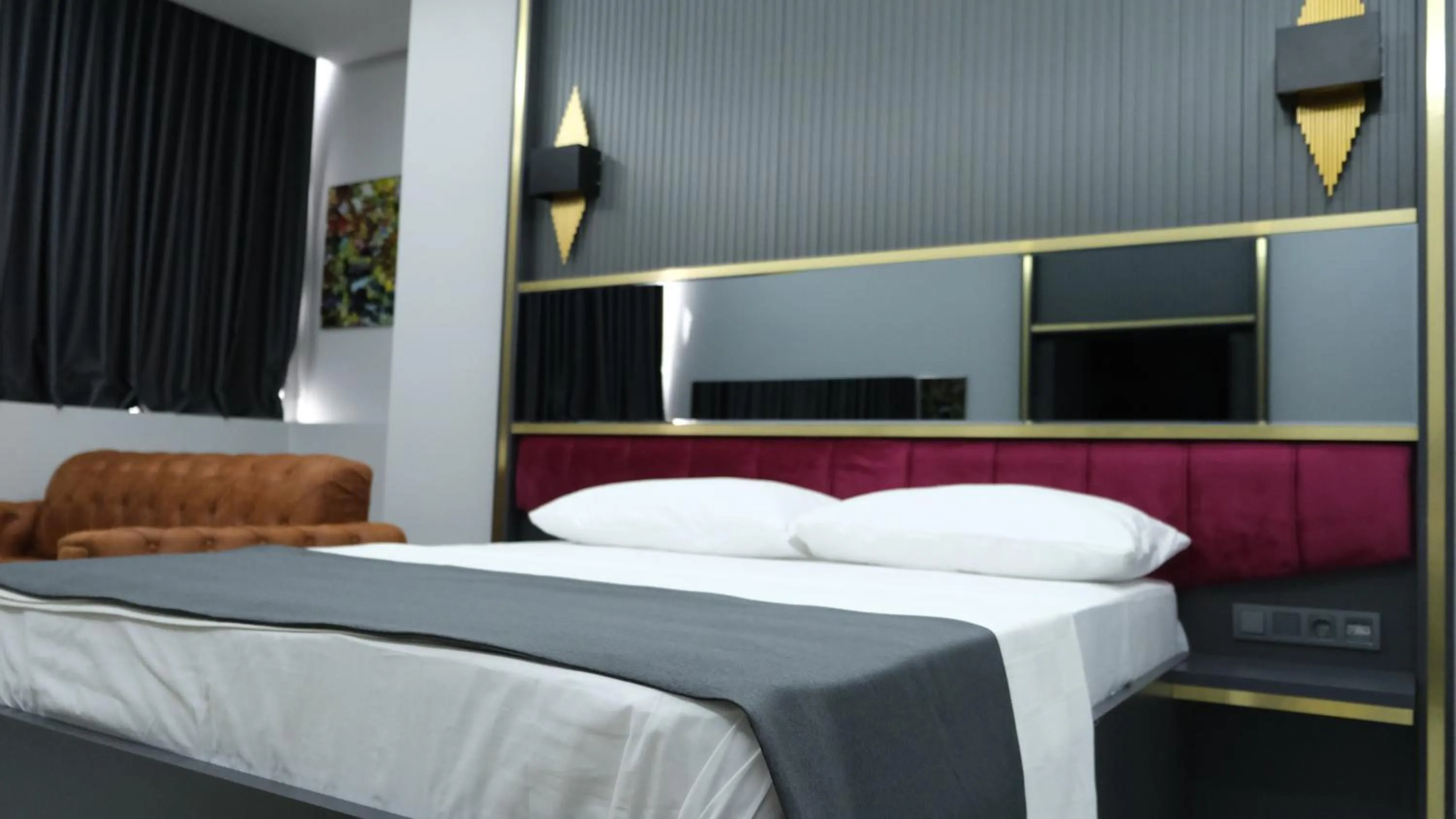 Bed in 216 Prestige Hotel