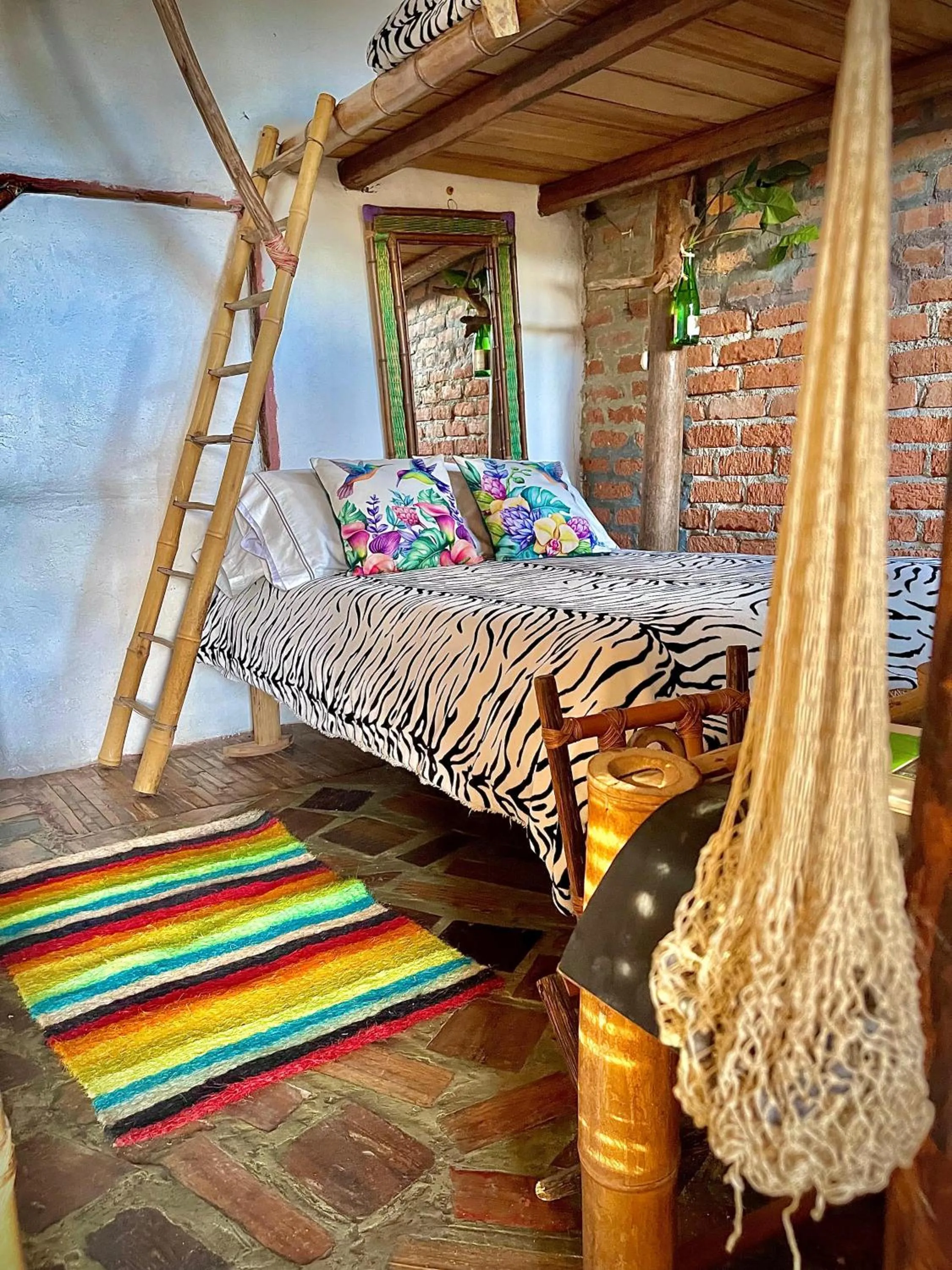 Bed in Hotel Casa Tarzan San Agustin