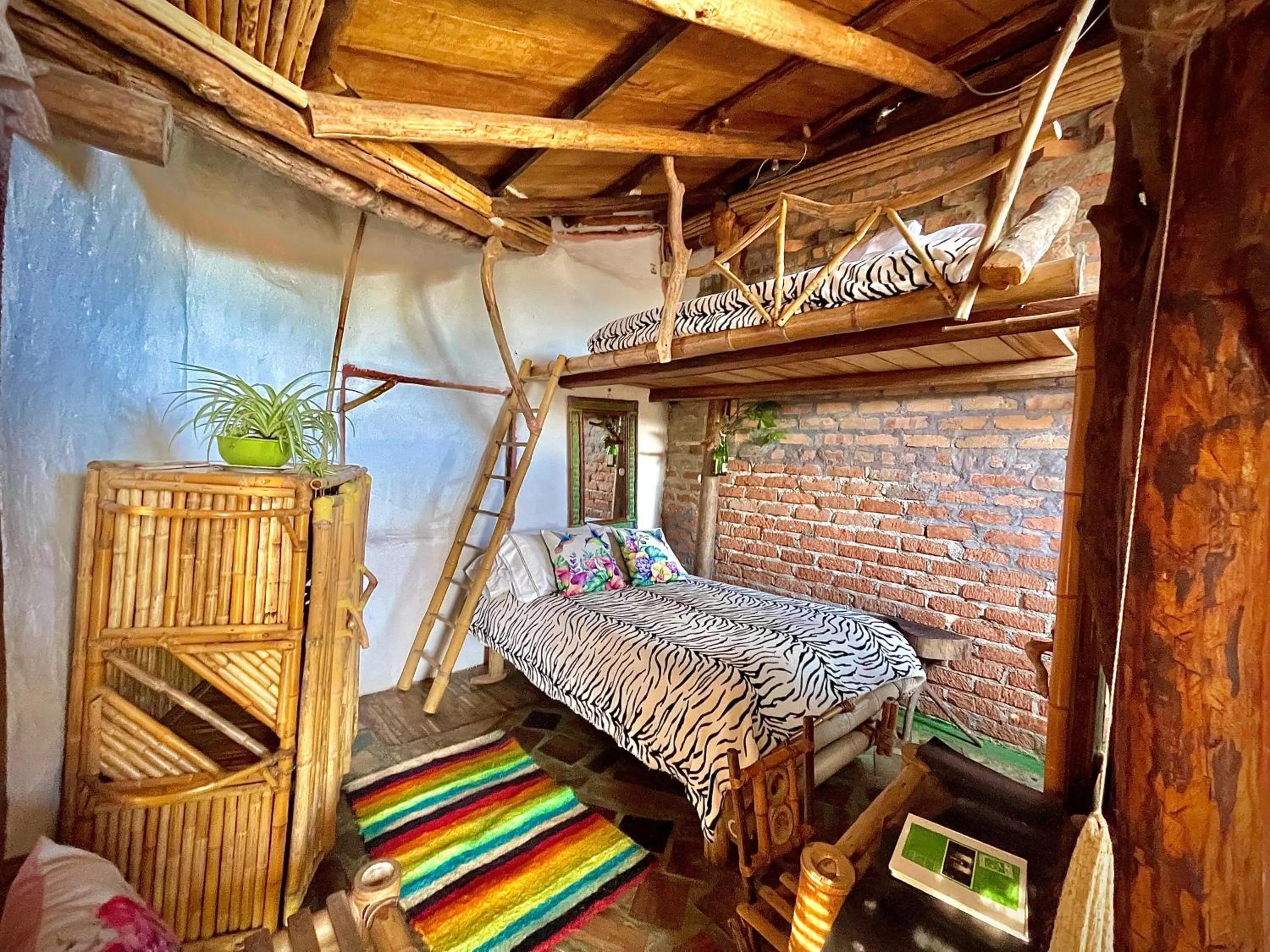Bed in Hotel Casa Tarzan San Agustin