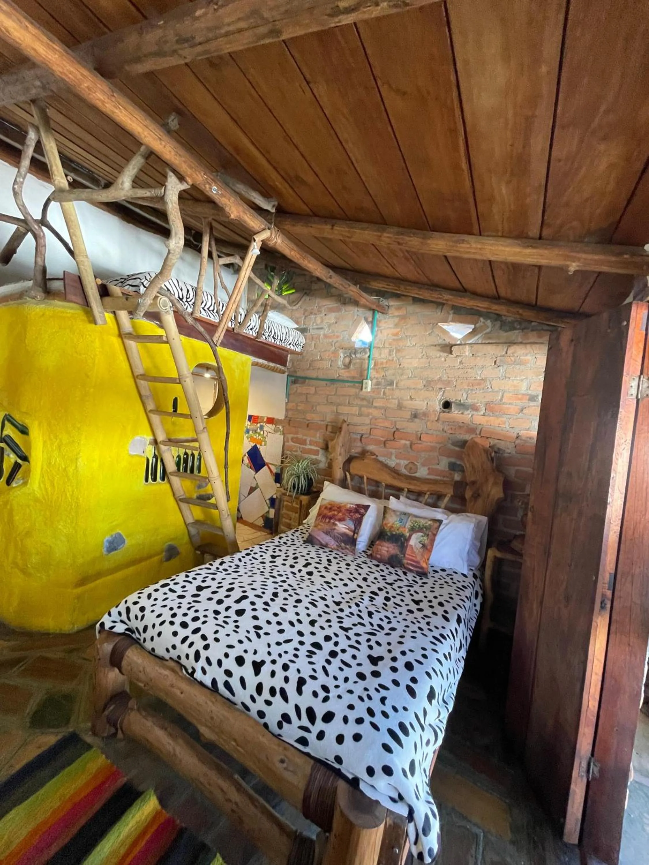 Bed in Hotel Casa Tarzan San Agustin