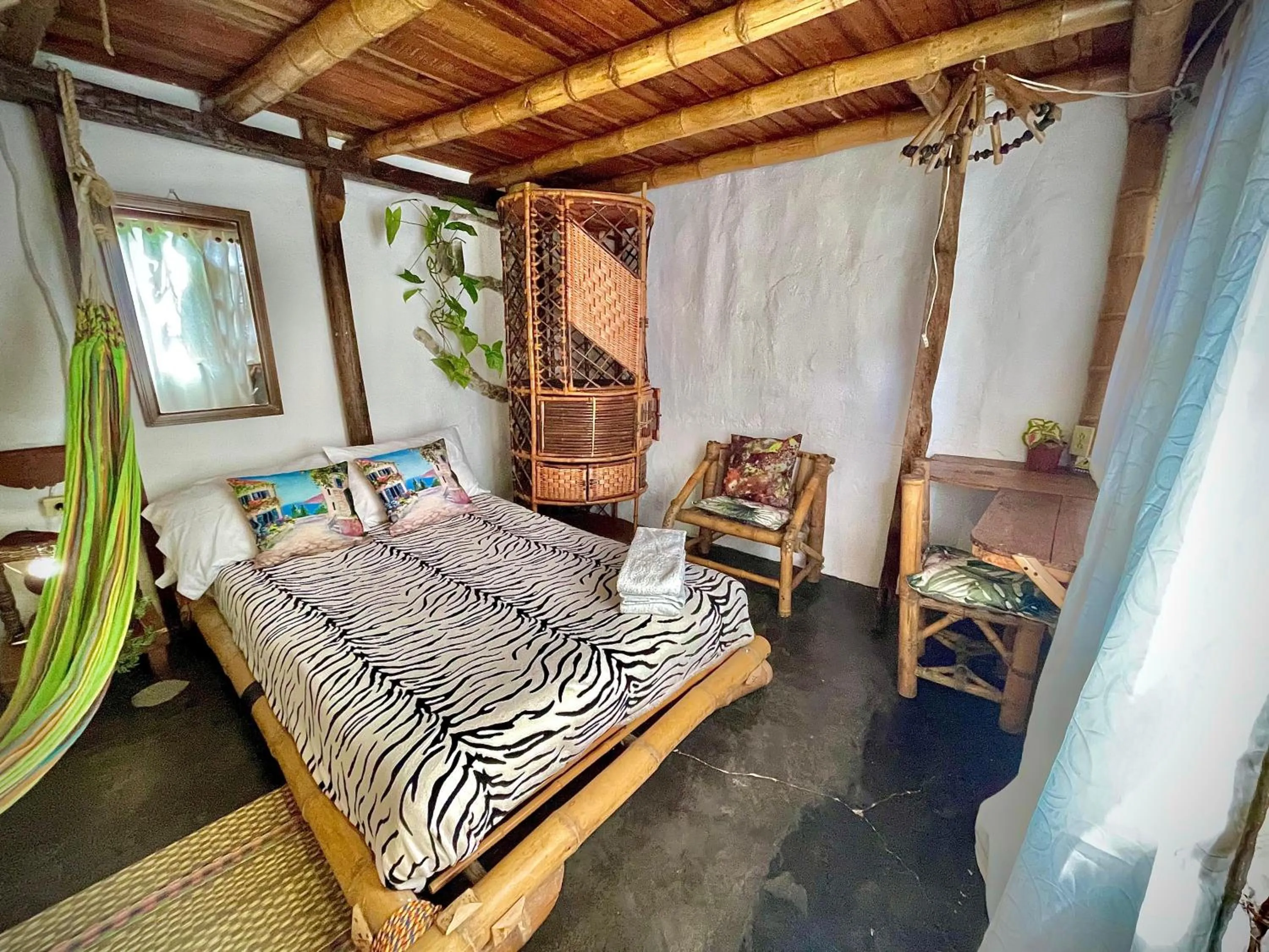 Bed in Hotel Casa Tarzan San Agustin