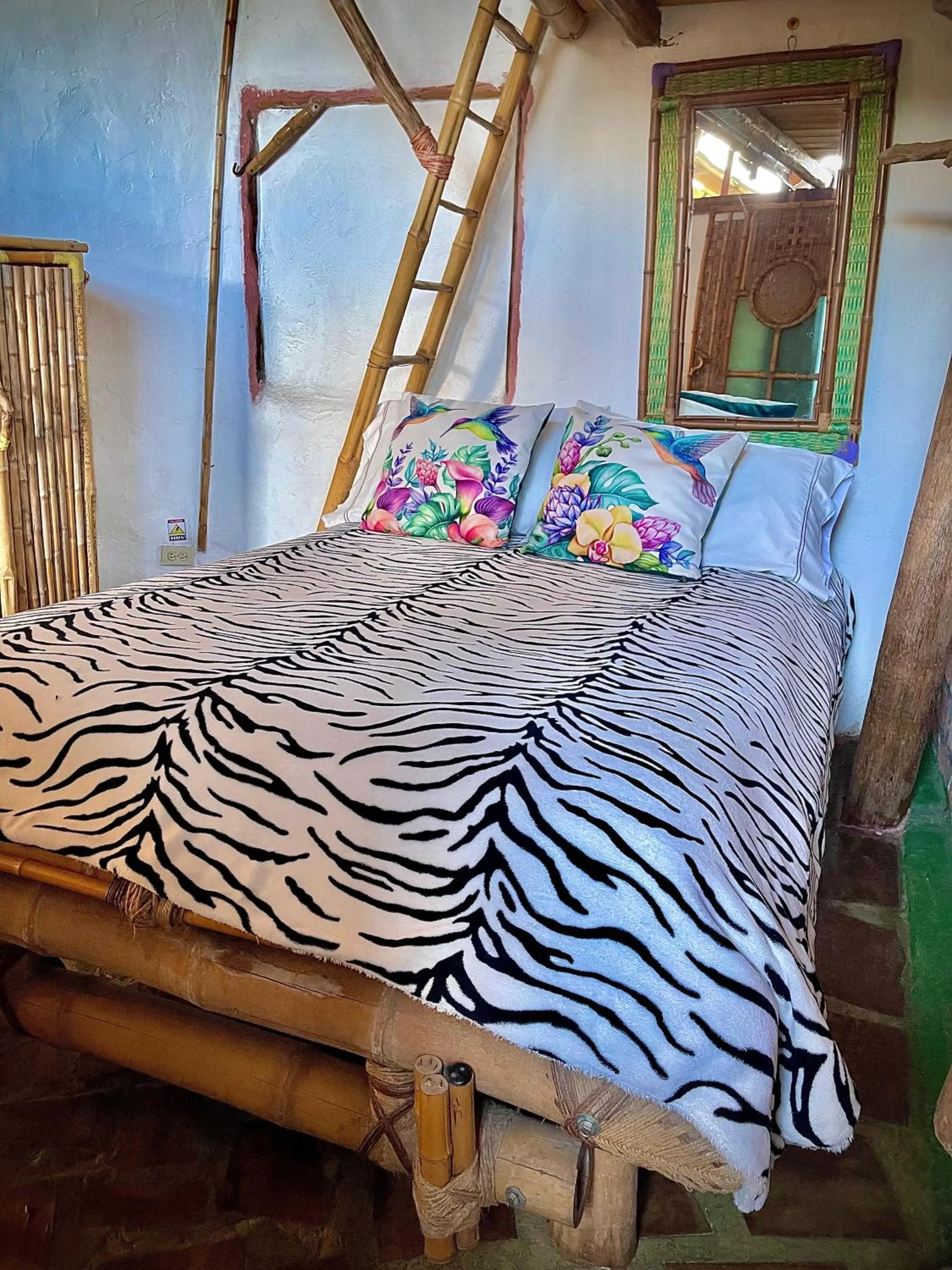 Bed in Hotel Casa Tarzan San Agustin